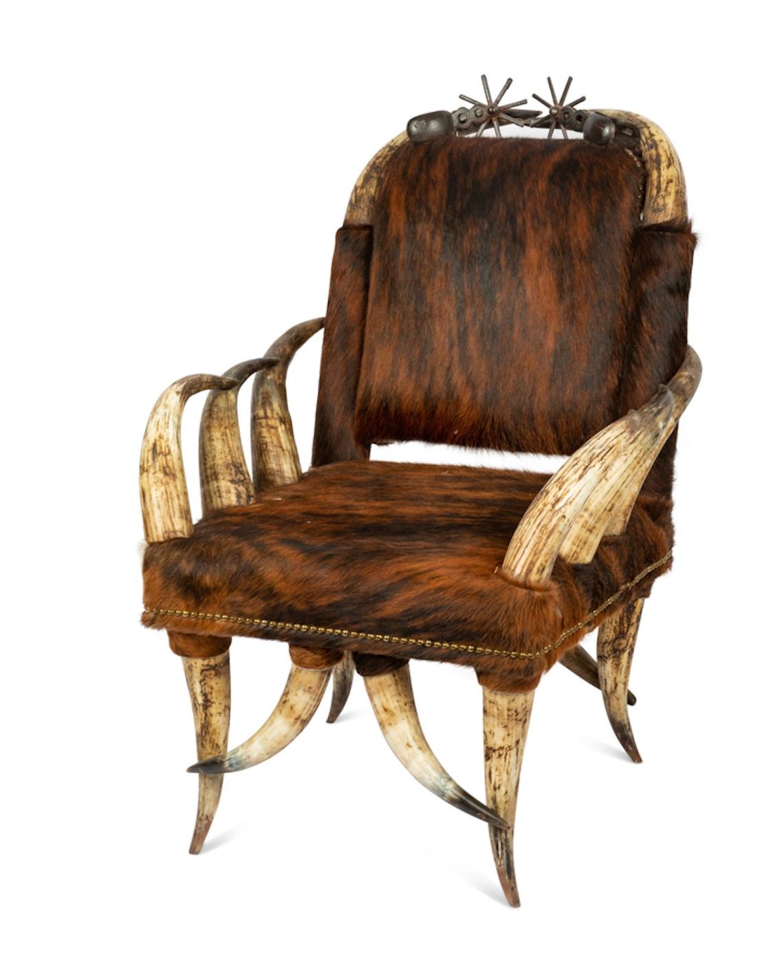 An English Horn Chair and Ottoman 20th Century adorned with spurs. Height 43 x  In Good Condition For Sale In Buchanan, MI