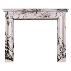 An English Moulded Bolection Fireplace in Calacatta Verde Marble