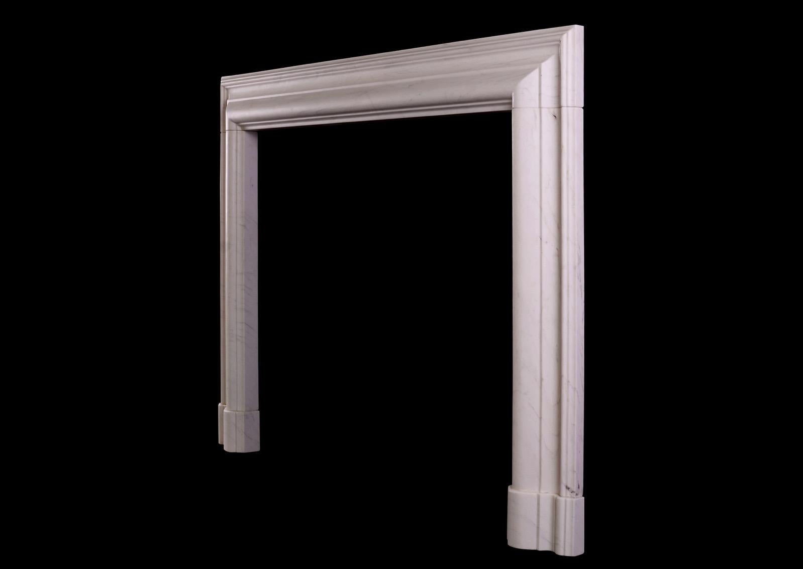 An English moulded bolection fireplace in white marble. An elegant shape, based on a period original. Modern.N.B. May be subject to an extended lead time, please enquire for more information.

Measures: Shelf width: 1432 mm 56 