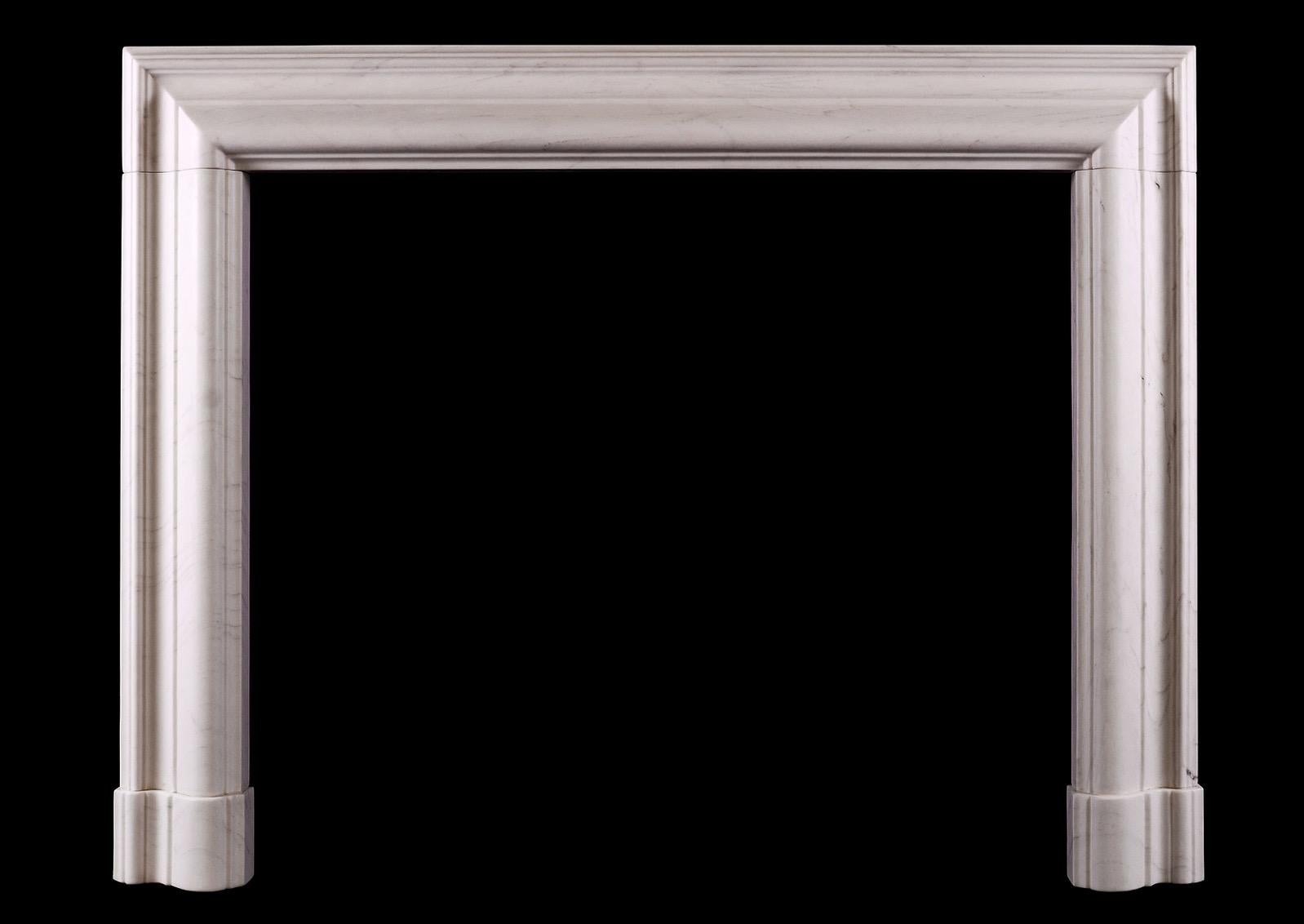 Contemporary English Moulded Bolection Fireplace in White Marble For Sale