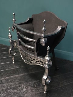An English Nickel & Steel Fire Grate with Phoenix