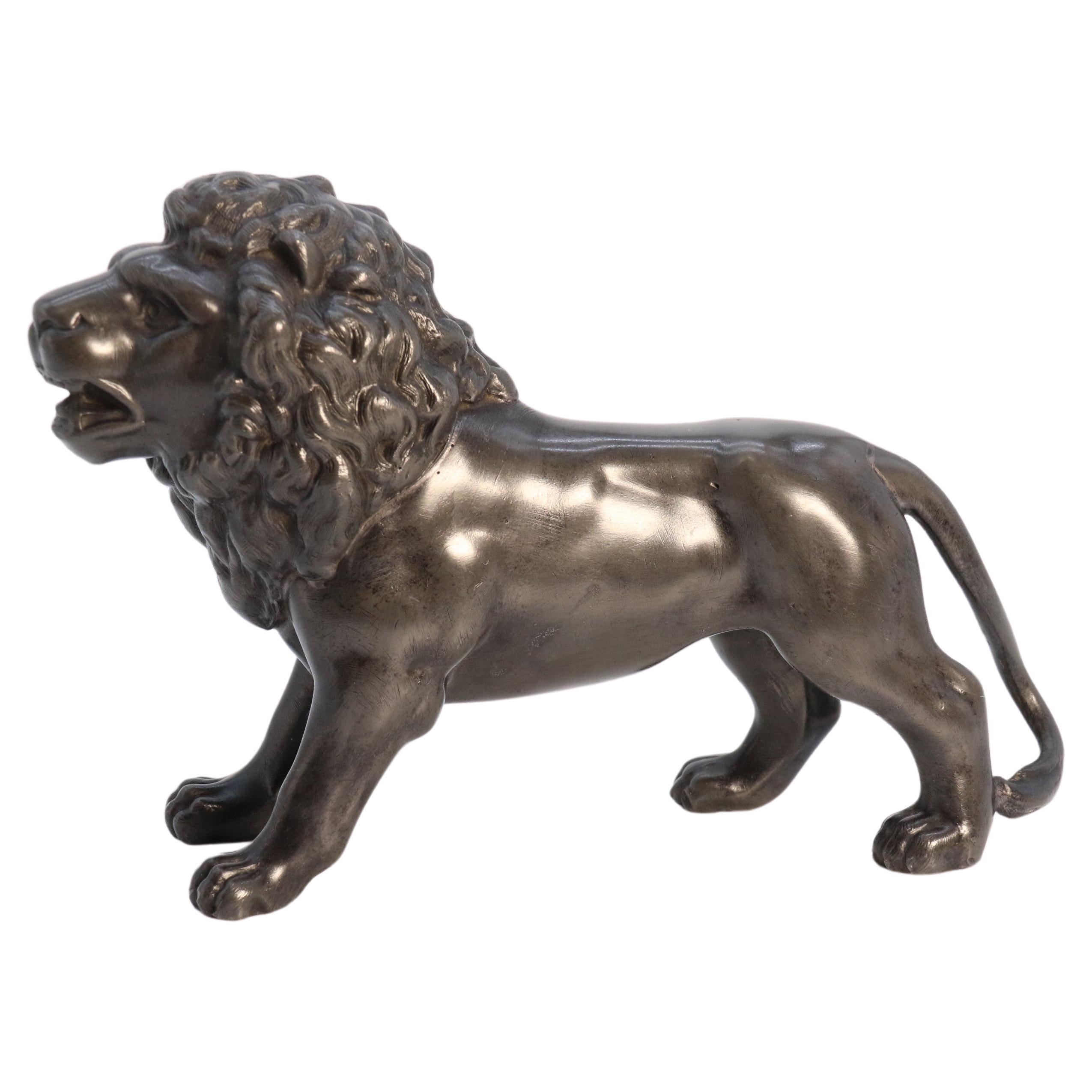 An English pewter study of a classical lion, circa 1840 For Sale