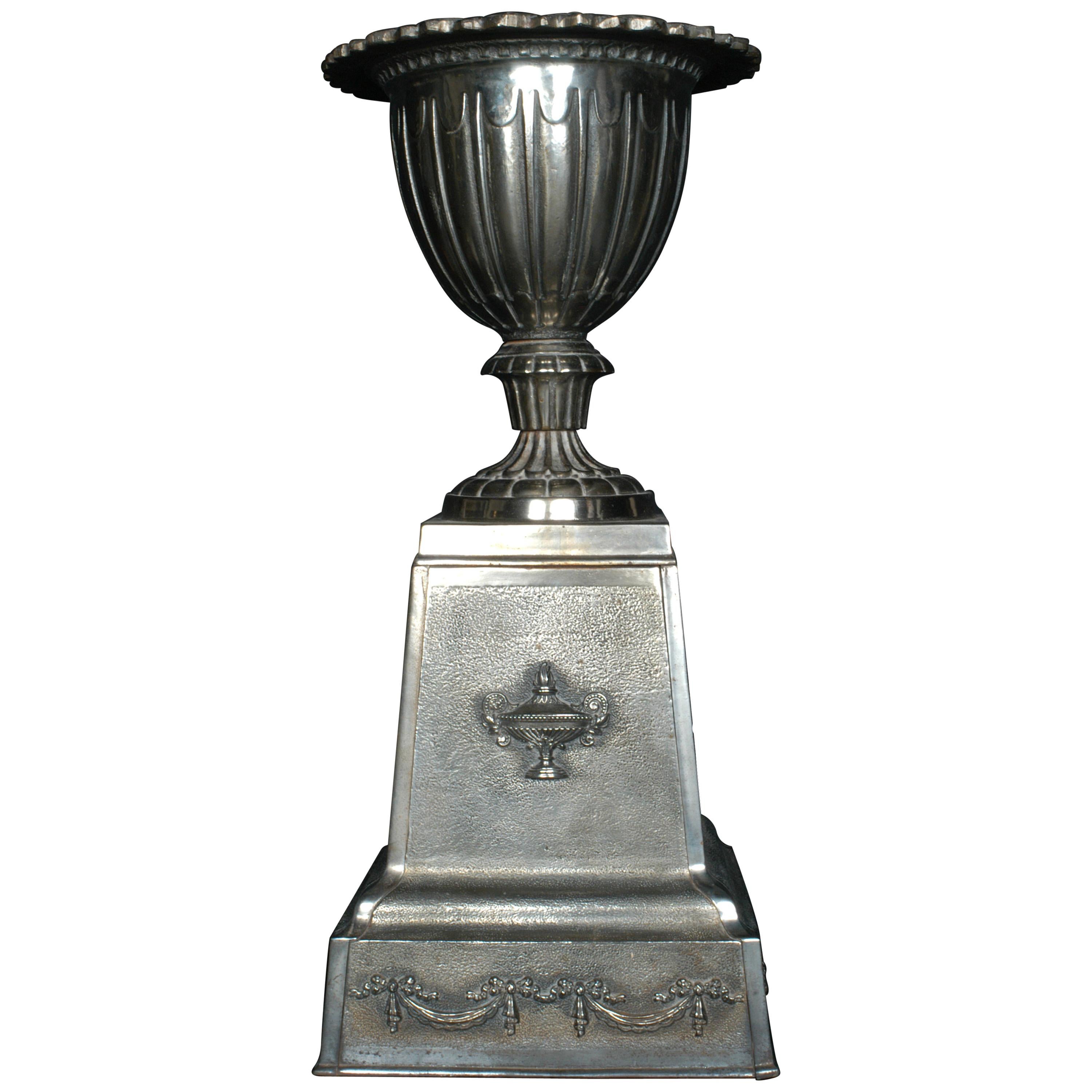 English Polished Cast Iron Urn on Plinth For Sale