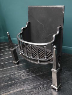 An English Polished Steel Fire Grate with Pinnacle Finials