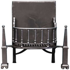 An English Polished Steel Fire Grate with Pinnacle Finials