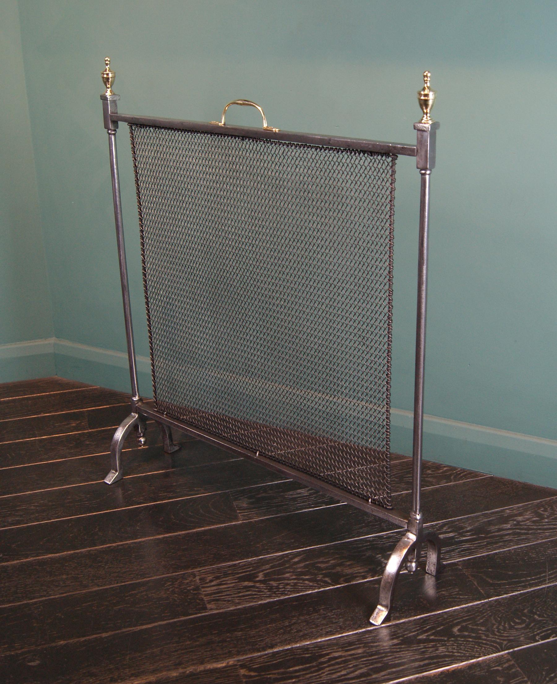 An elegant English polished steel fire screen. The steel frame with separate mesh panel on arched supports. Brass handle and urn finials uppermost.  Restored.

Circa 19th century

Vat to be added to the list price in the UK.