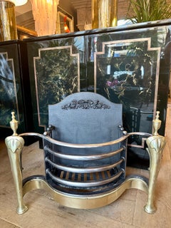 An English Queen Anne Style Wrought Iron And Brass Fire Grate