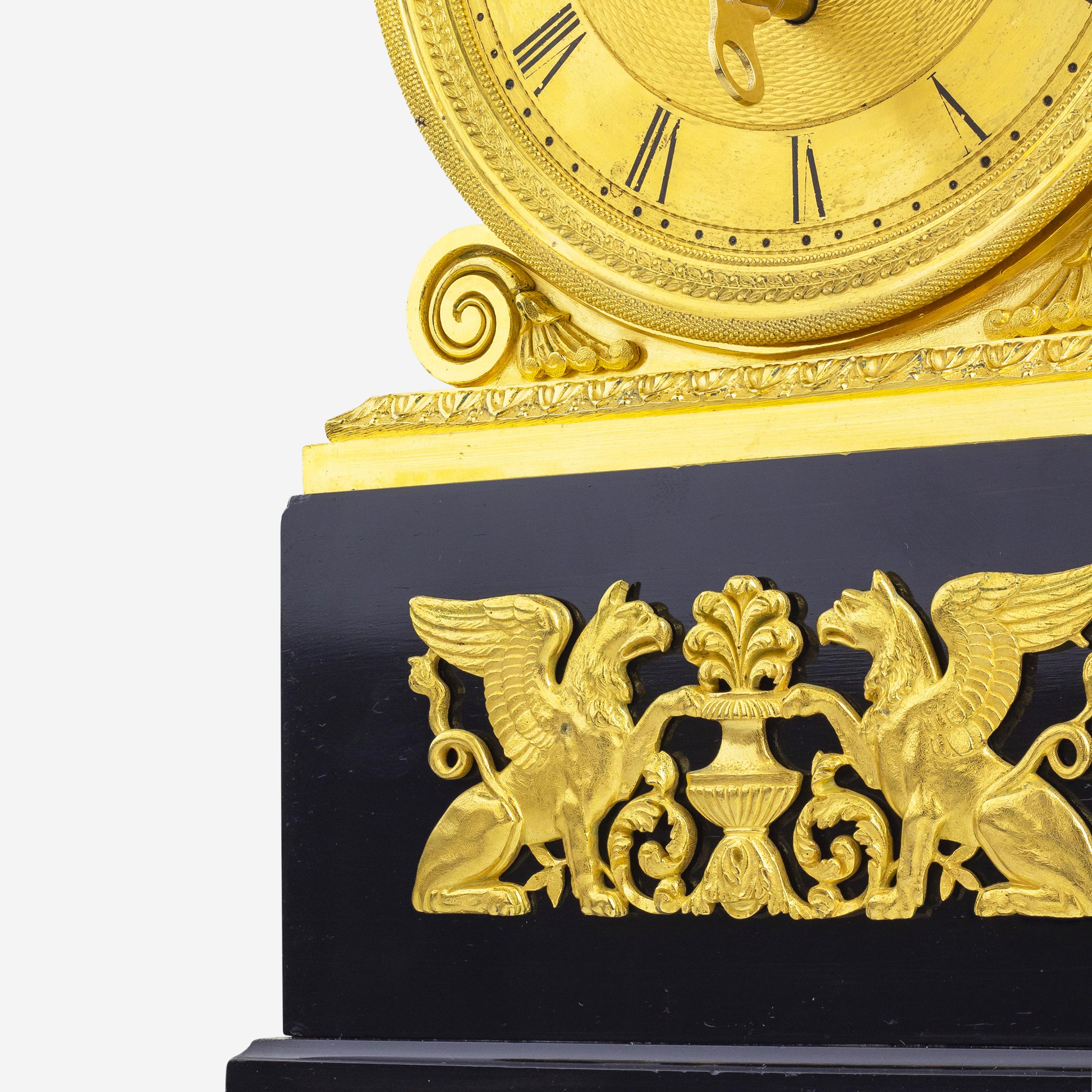 Whilst we don't regularly specialise in clocks, we took an exception to this one and it is perhaps the nicest we have had to date. Crafted in London during the Regency period, this table clock was made by the respected firm Grimalde & Johnson, who
