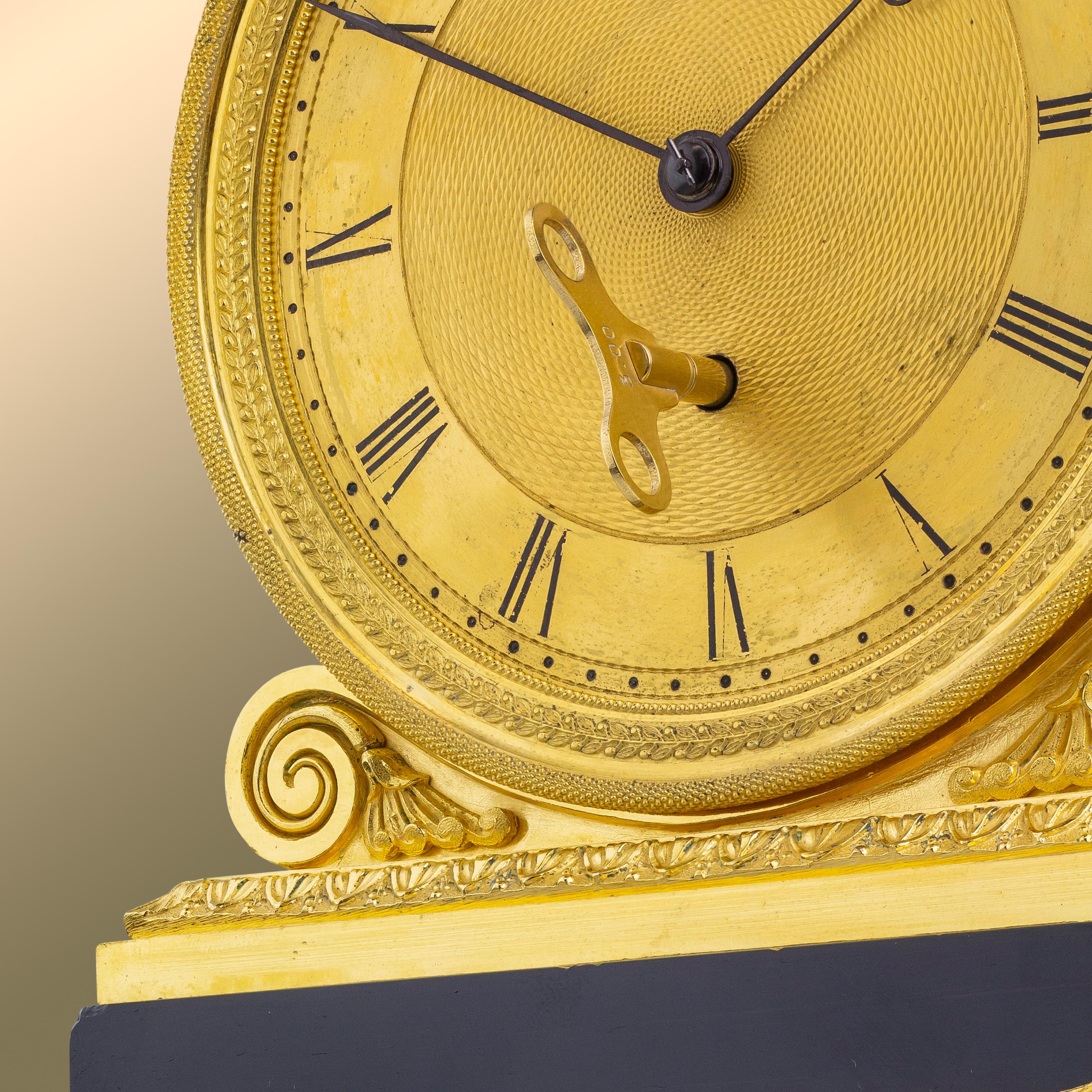 19th Century An English Regency Mantel Clock in Slate & Ormolu by Grimalde & Johnson For Sale