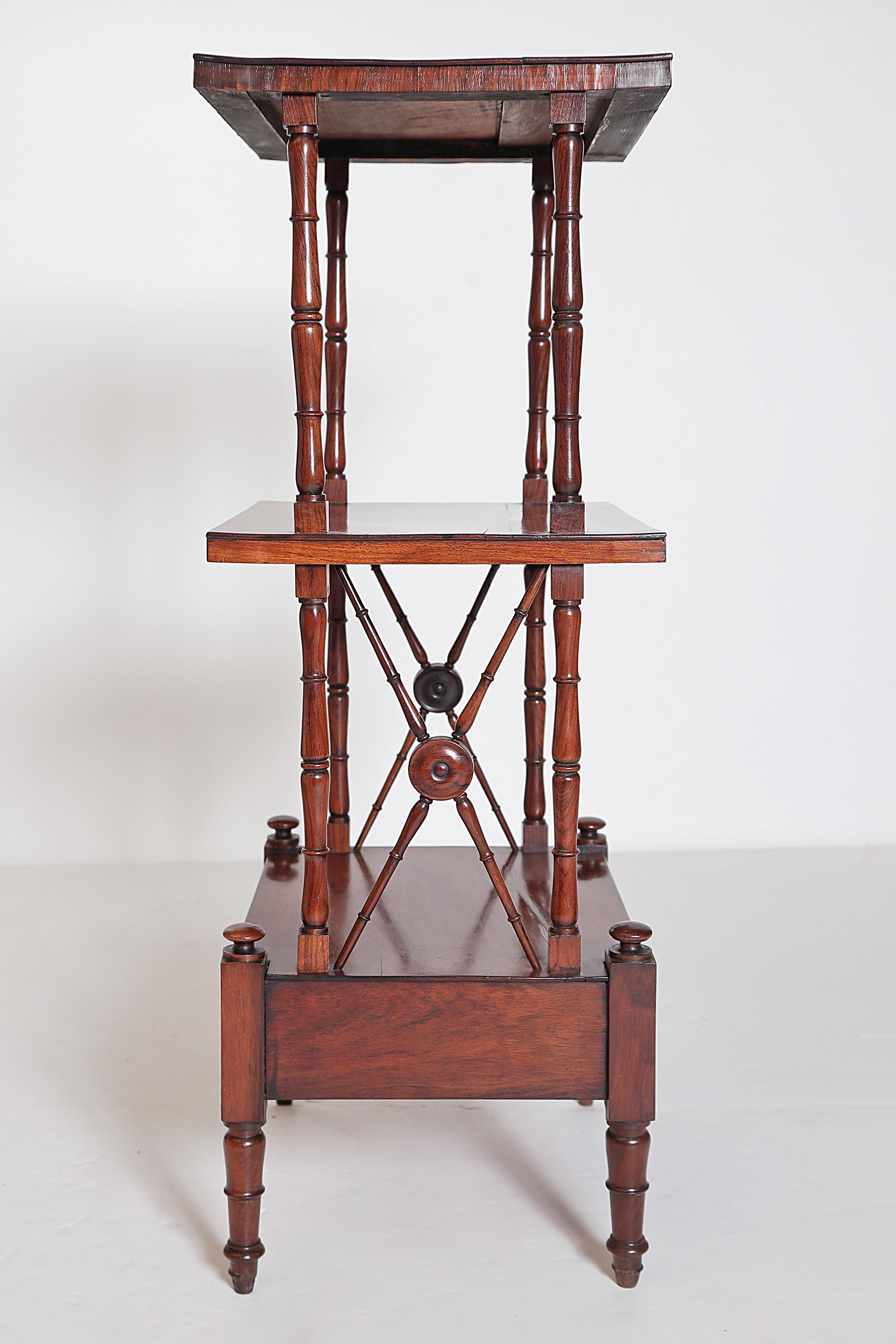 An English Regency Rosewood 3-Tiered Whatnot 8