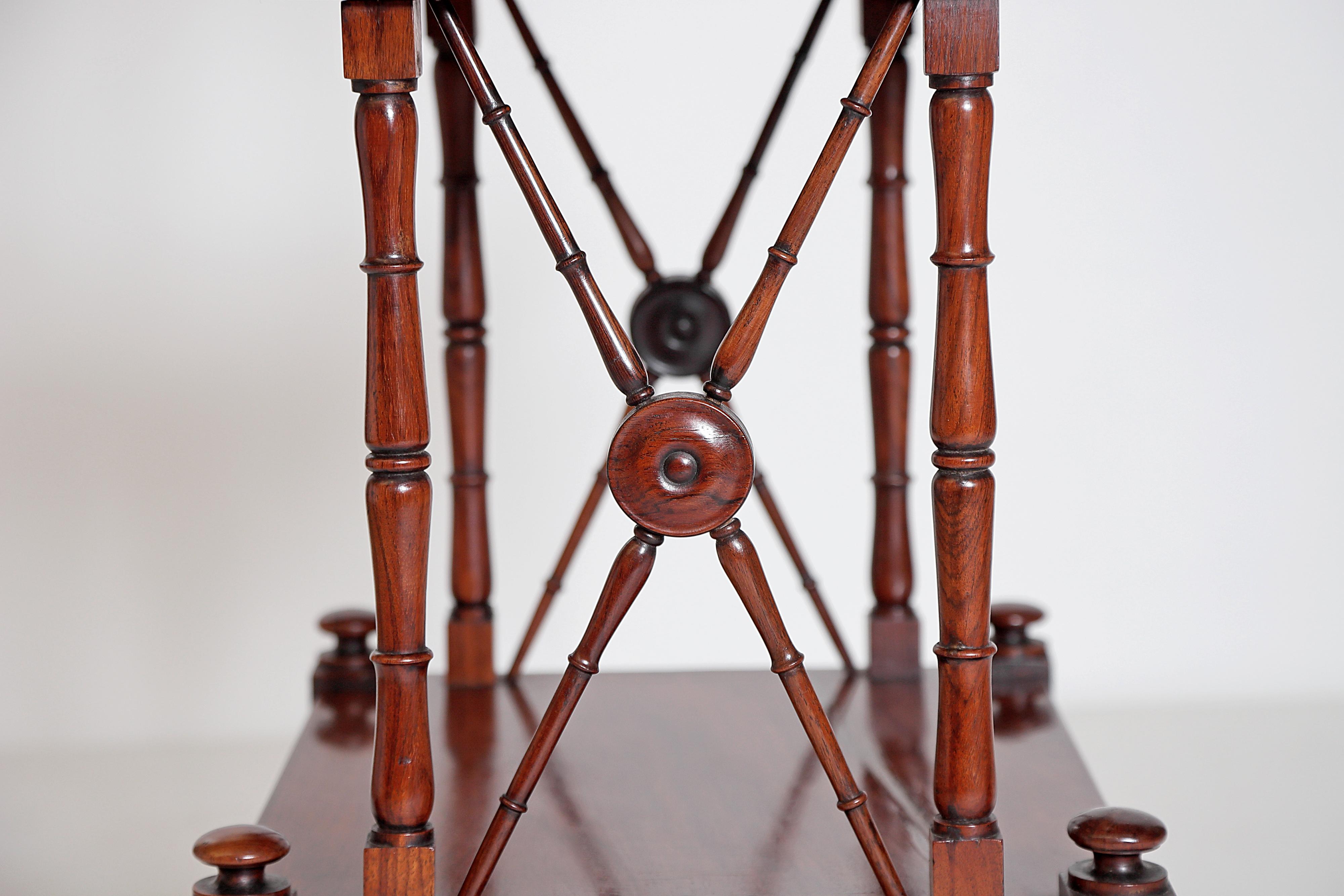An English Regency Rosewood 3-Tiered Whatnot 9
