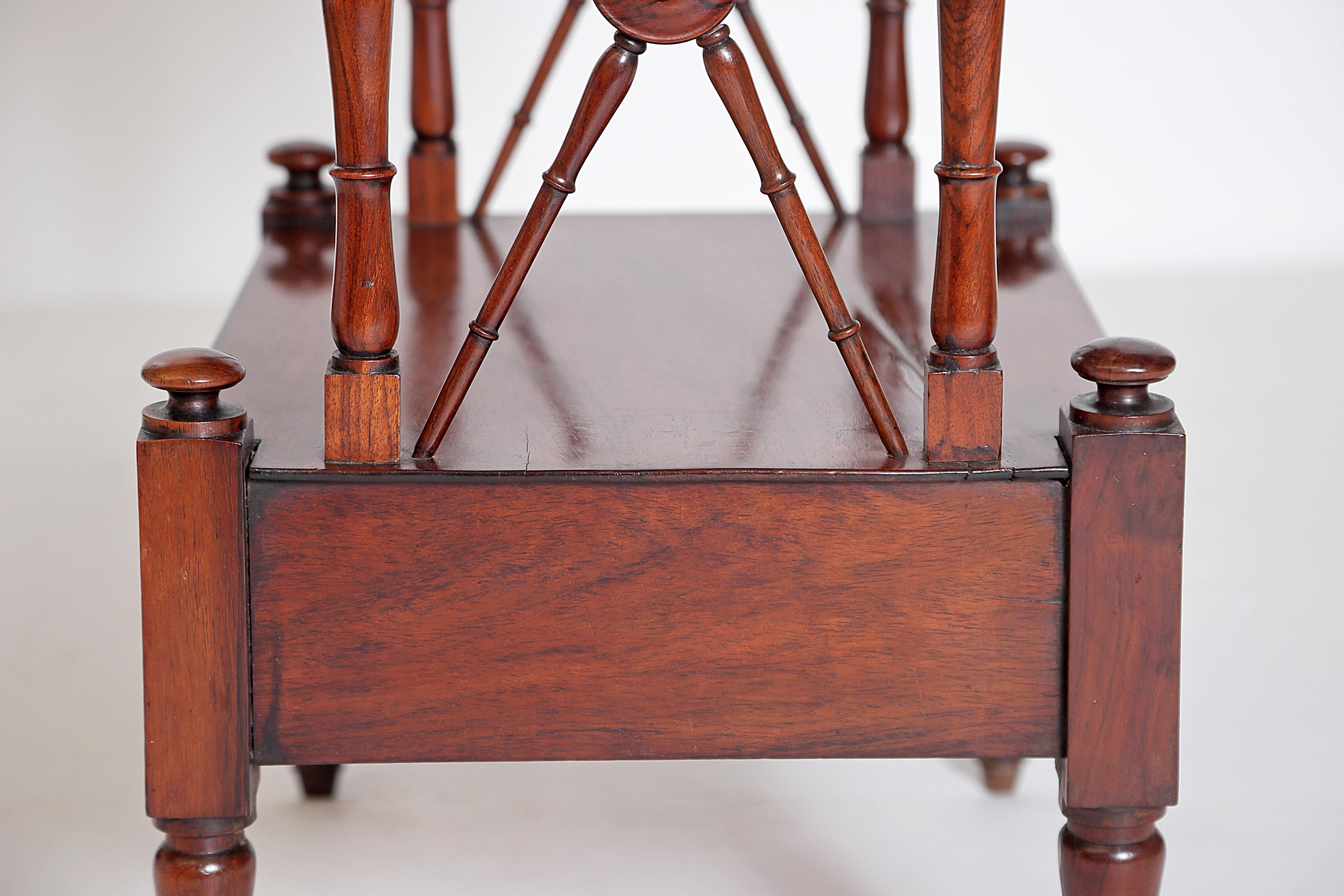 An English Regency Rosewood 3-Tiered Whatnot 10