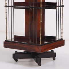 An English rosewood revolving bookcase, C. 1890.