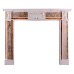 An English Statuary Fireplace with Italian Siena Marble Inlay