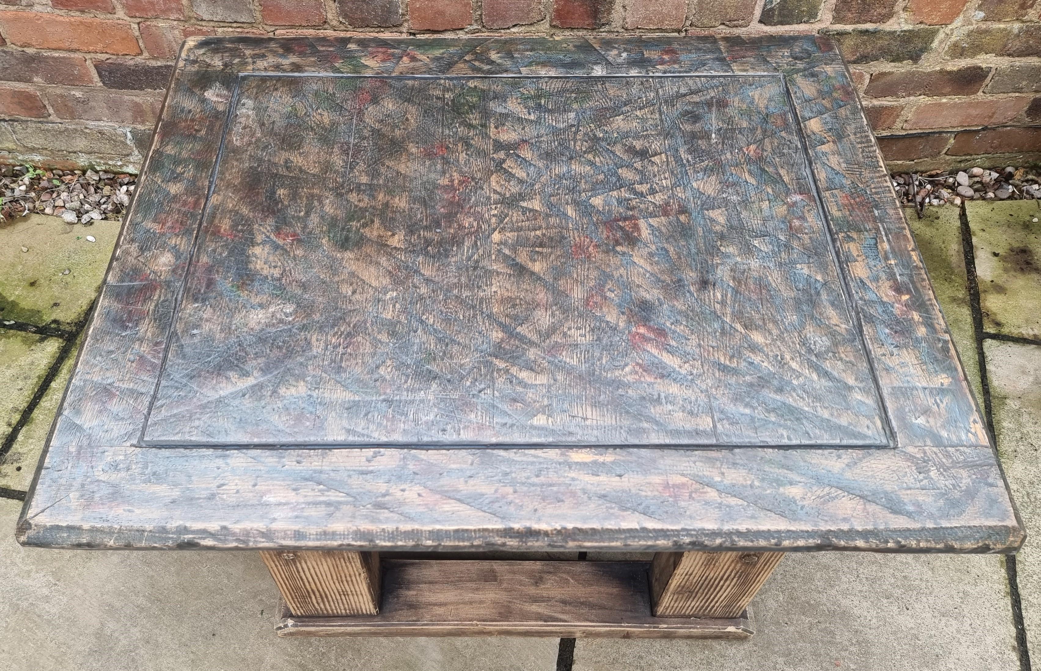 This most interesting industrial table or stand is incredibly sturdy and substantial in its construction, made from oak and pitch pine.

The joints are dowled and screwed. This table is very heavy and has a most unusual look.

It was originally