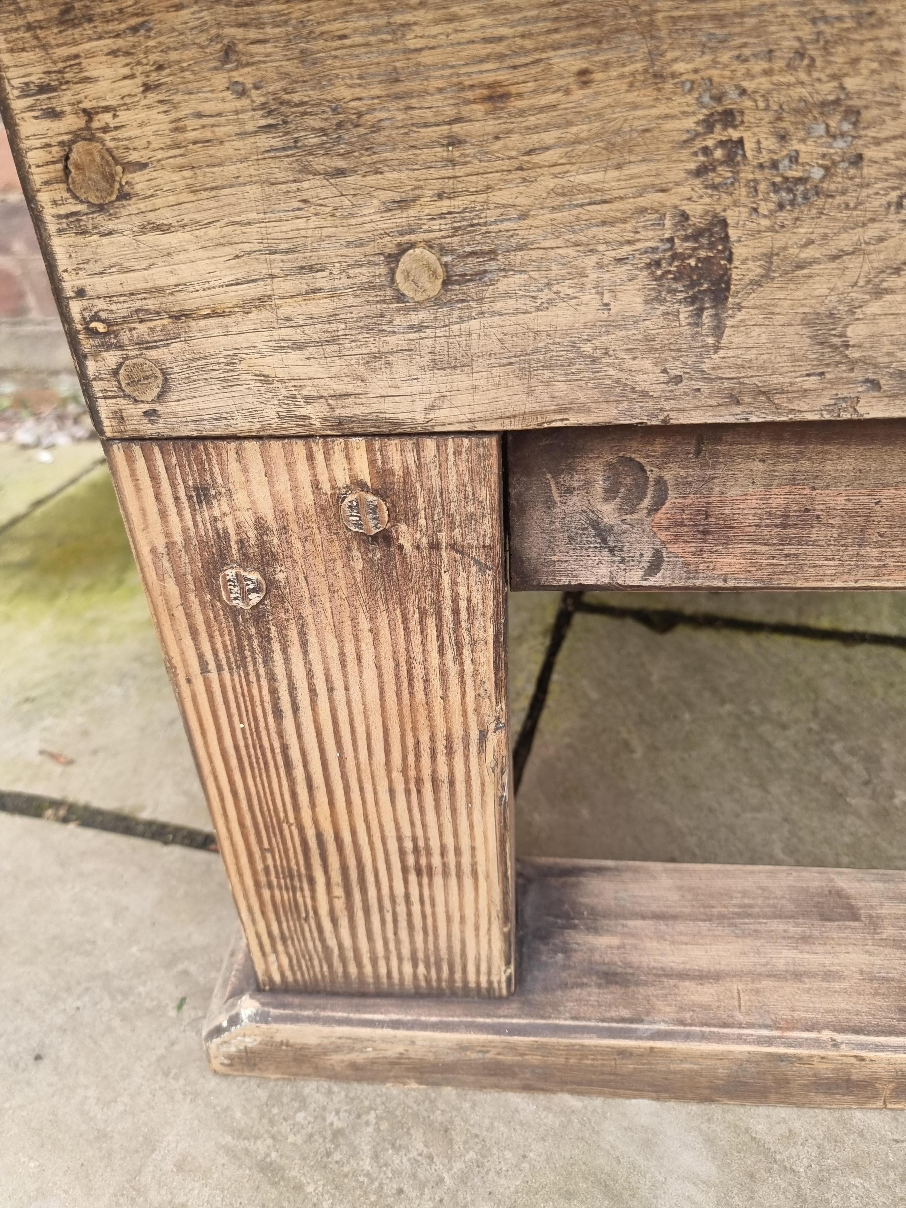 Hand-Carved An English coffee or low table made in a rustic style, circa 1910 For Sale