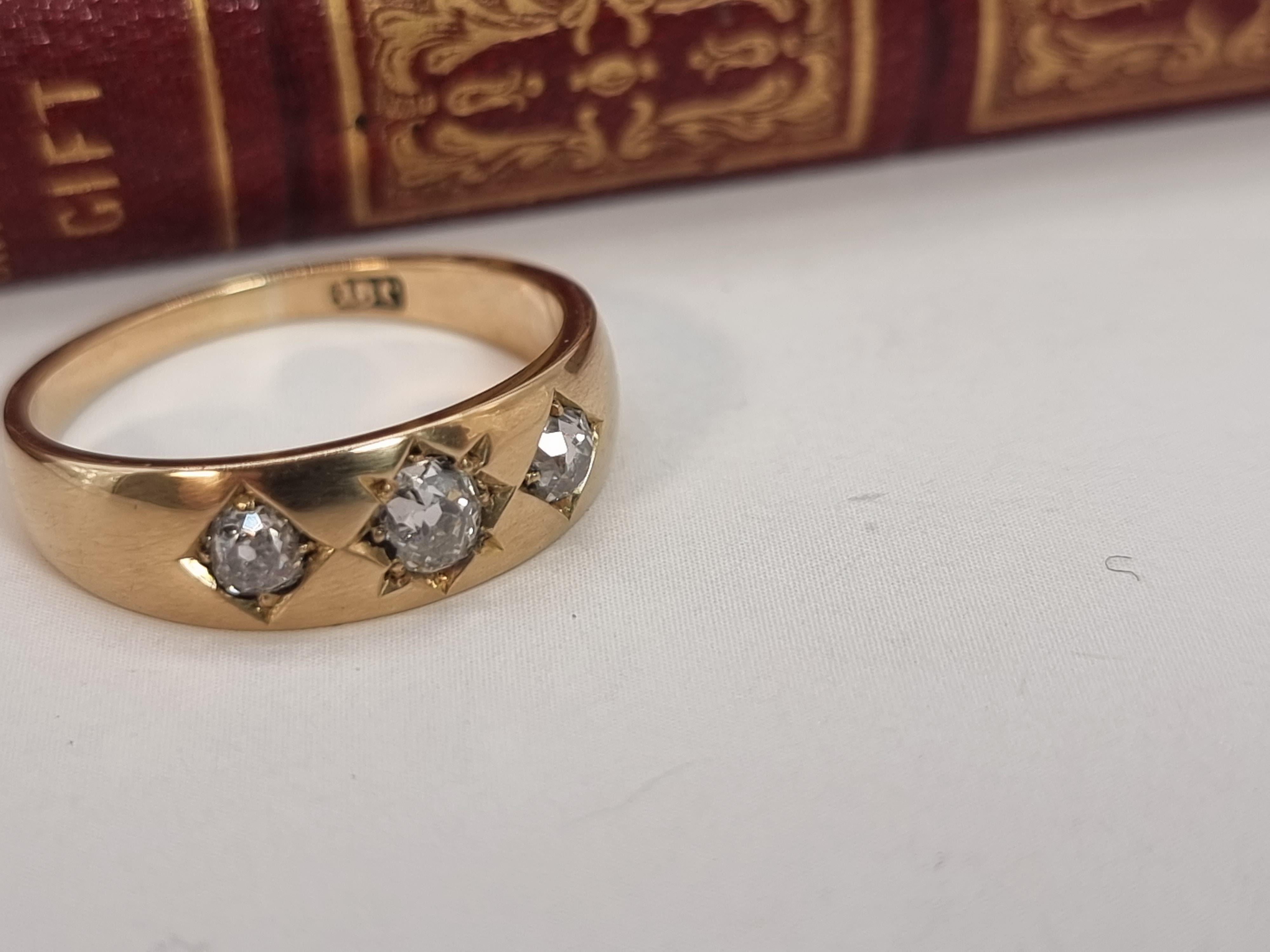 An English Victorian heavy 18ct gold and diamond three stone ring dated 1870 For Sale 1