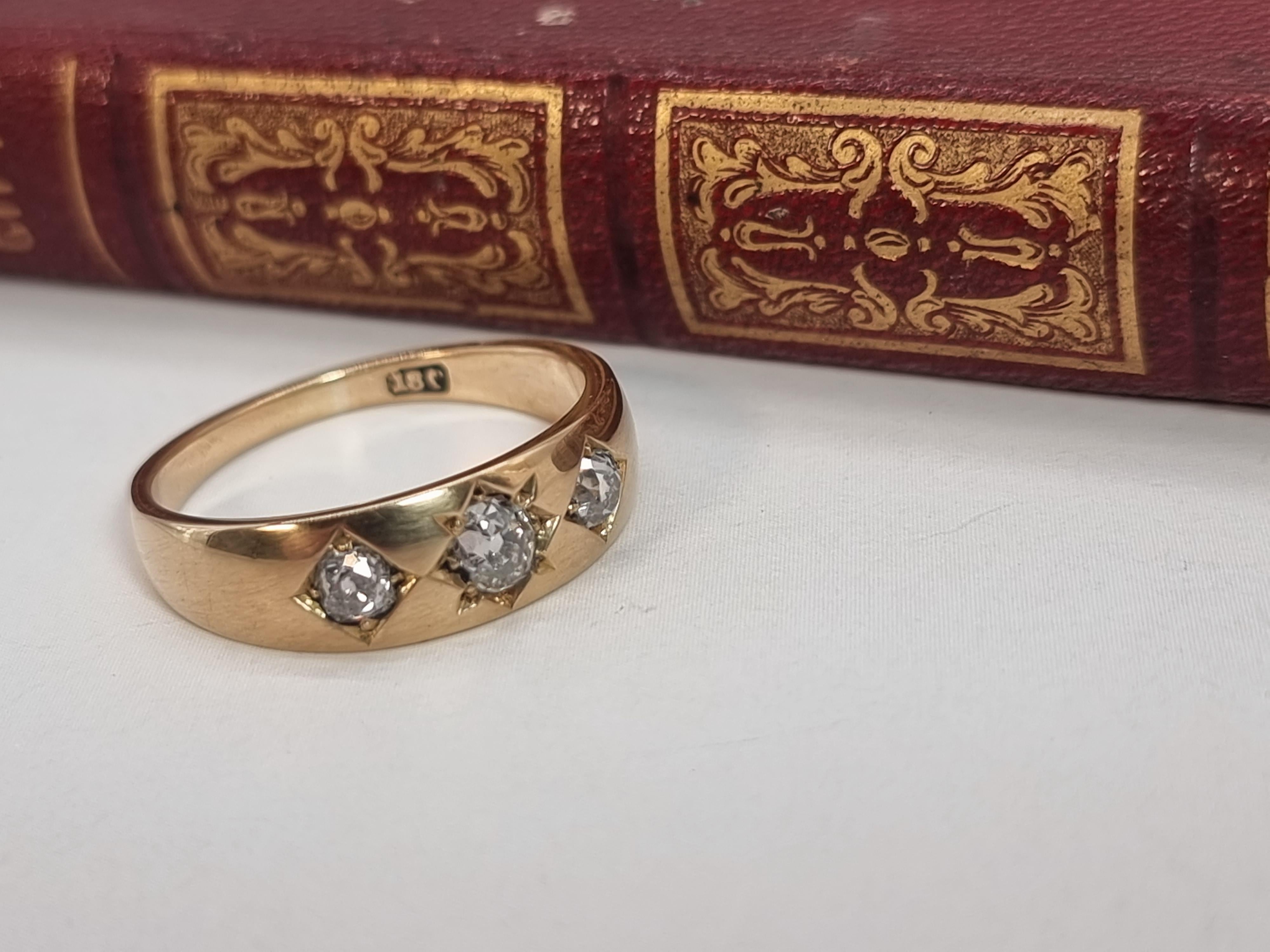An English Victorian heavy 18ct gold and diamond three stone ring dated 1870 For Sale 2