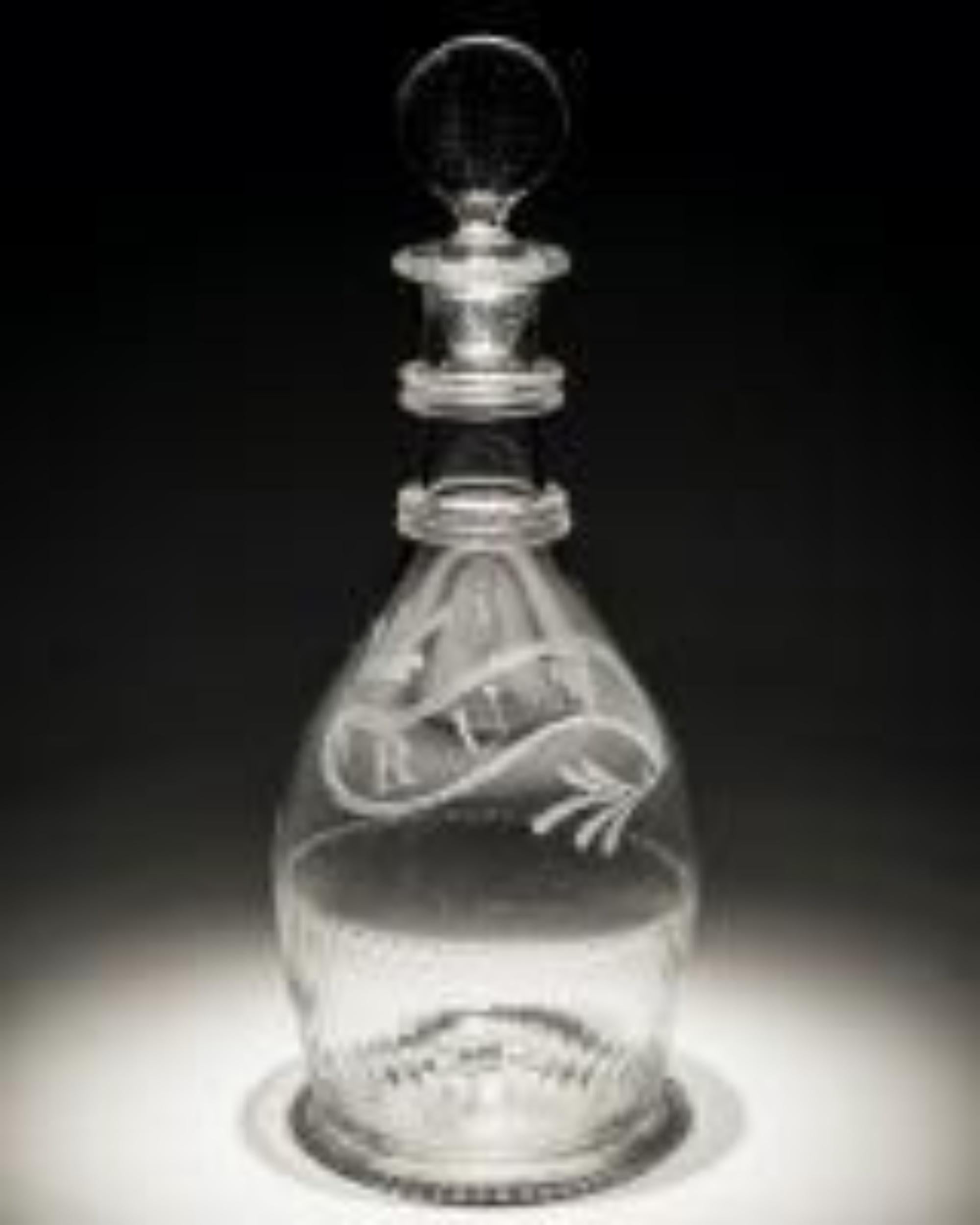 An Irish slice cut decanter with engraved rum label attributed to Cork & Co.
Ireland, 1790.