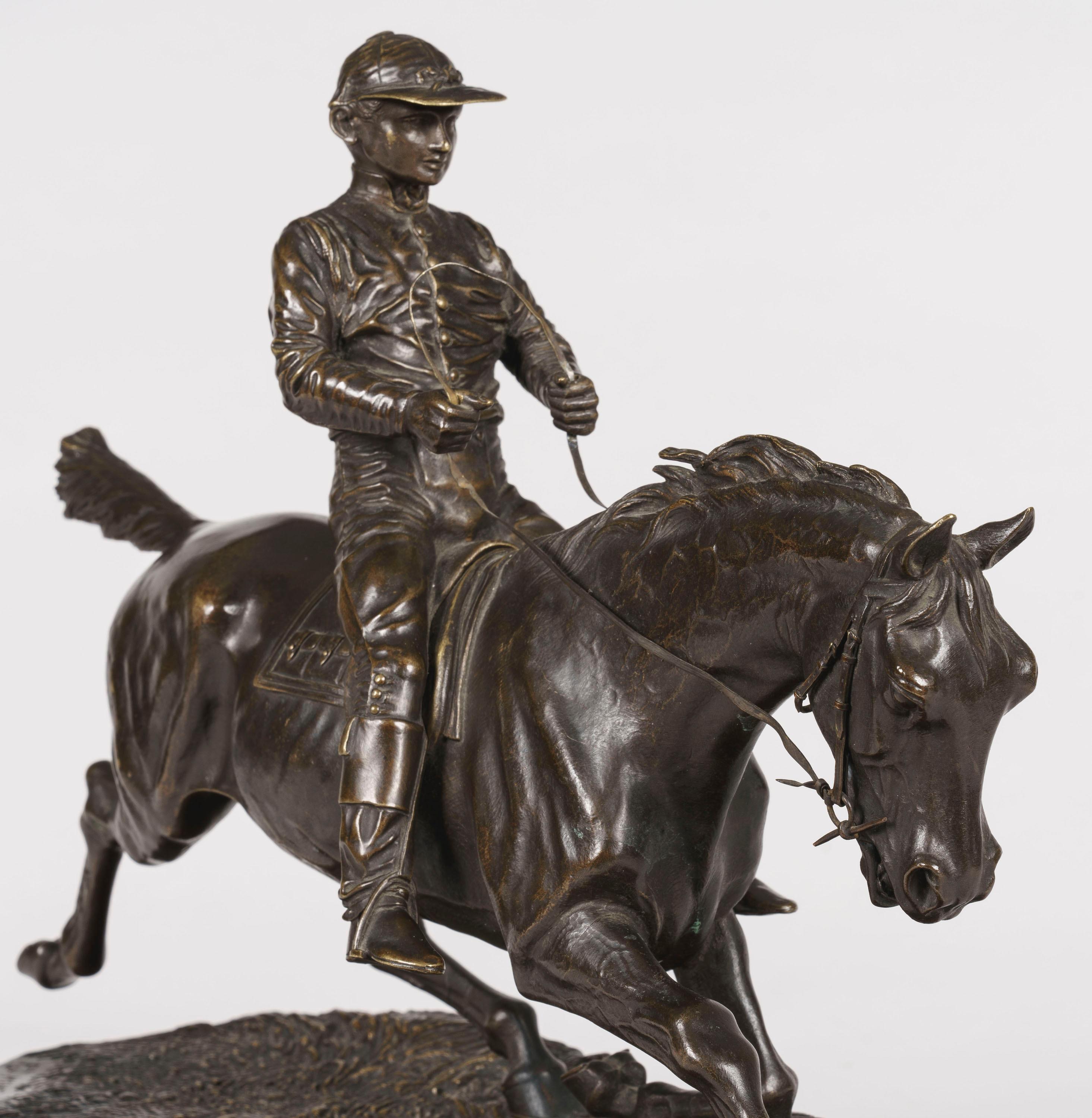 An equestrian sculpture
after Pierre-Jules Mêne

A naturalistic, carefully detailed and beautifully patinated bronze model of a jockey on his galloping horse, the realistic topographical base signed 