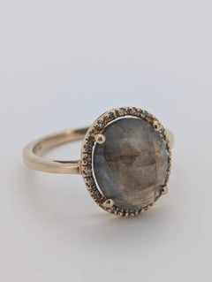 An Ethereal Rose-Cut Smoky quartz and Halo Ring in 9k Gold