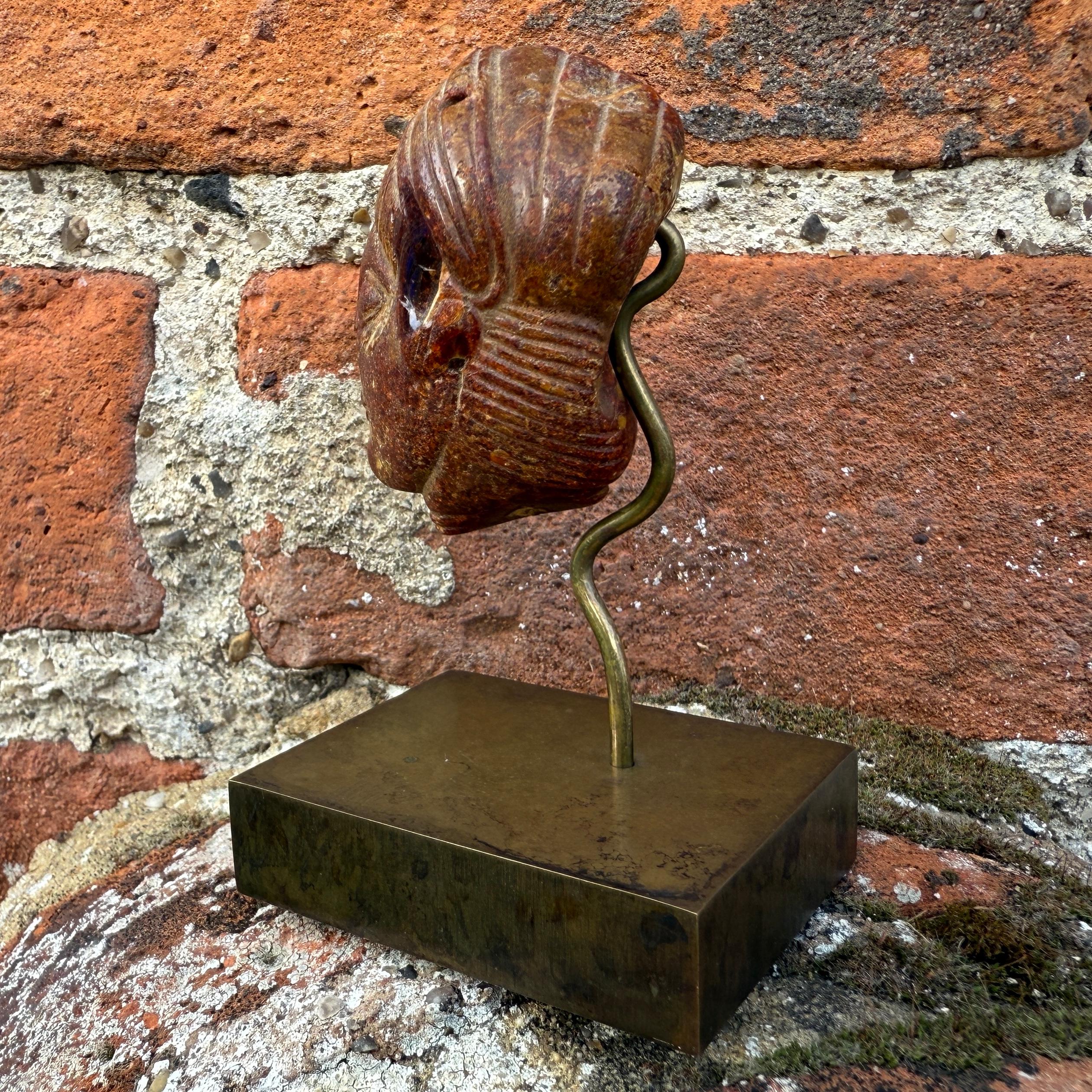 An Etruscan Amber Head Pendant. Etruria, circa 5th century B.C. In Fair Condition For Sale In London, GB