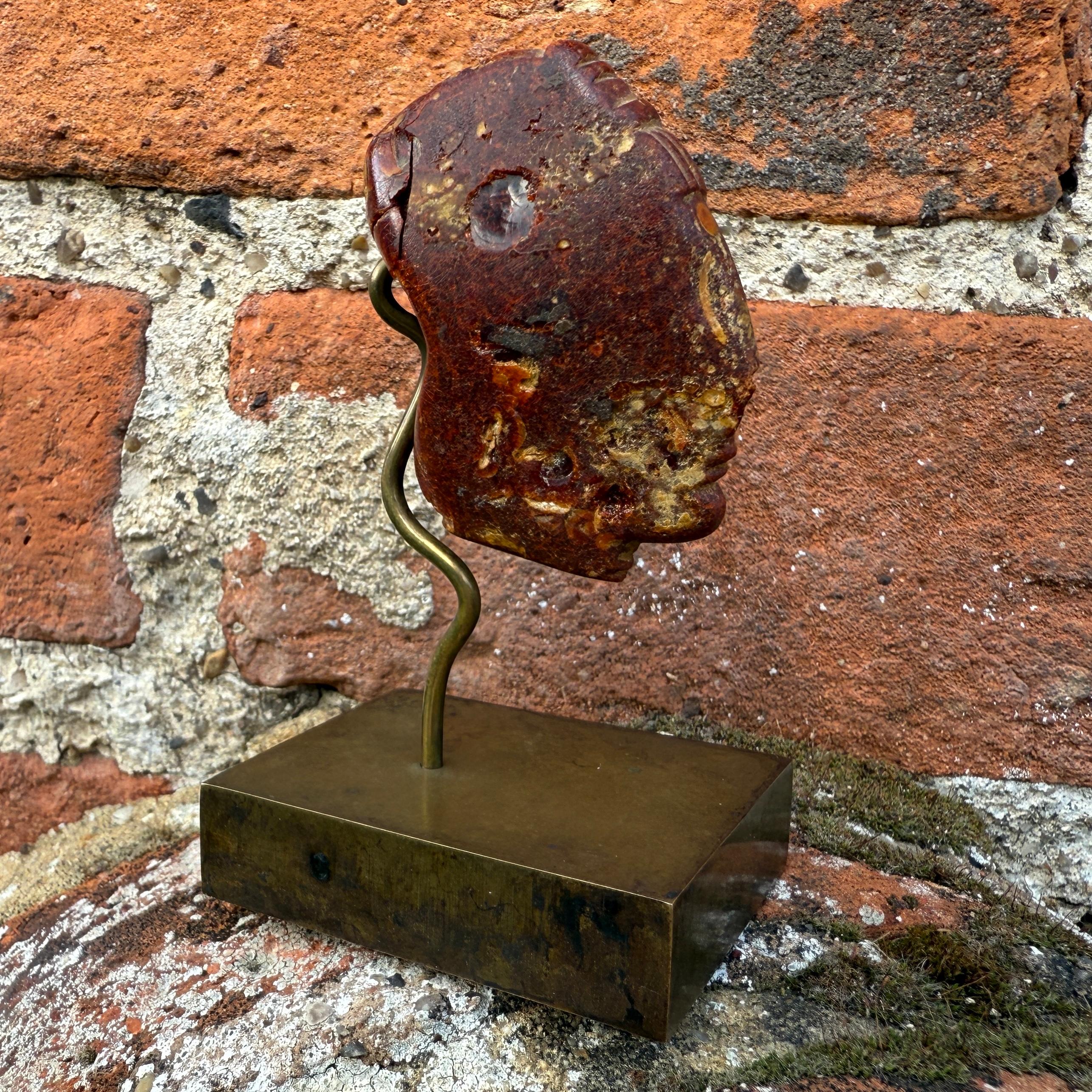 An Etruscan Amber Head Pendant. Etruria, circa 5th century B.C. For Sale 1