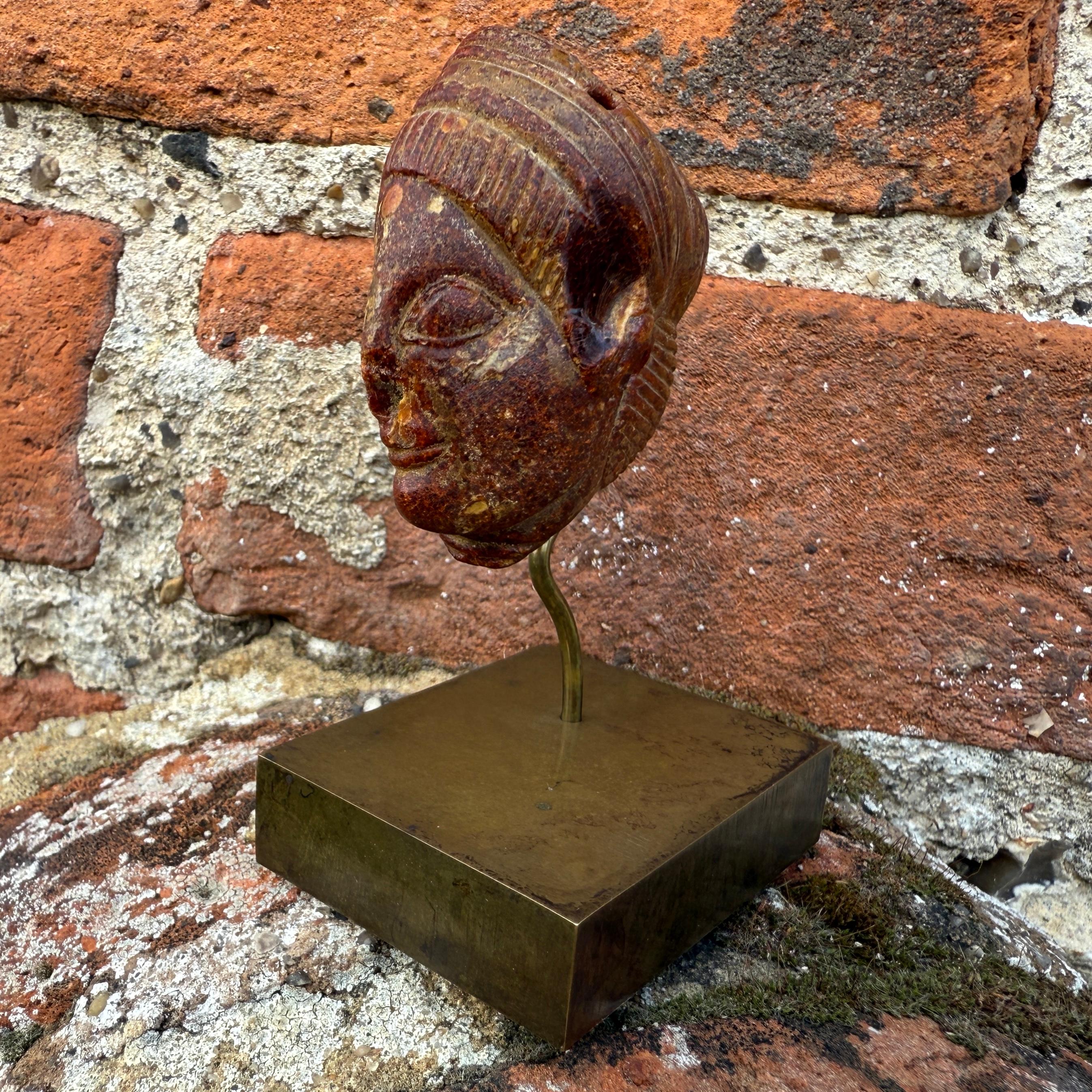 An Etruscan Amber Head Pendant. Etruria, circa 5th century B.C. For Sale 2