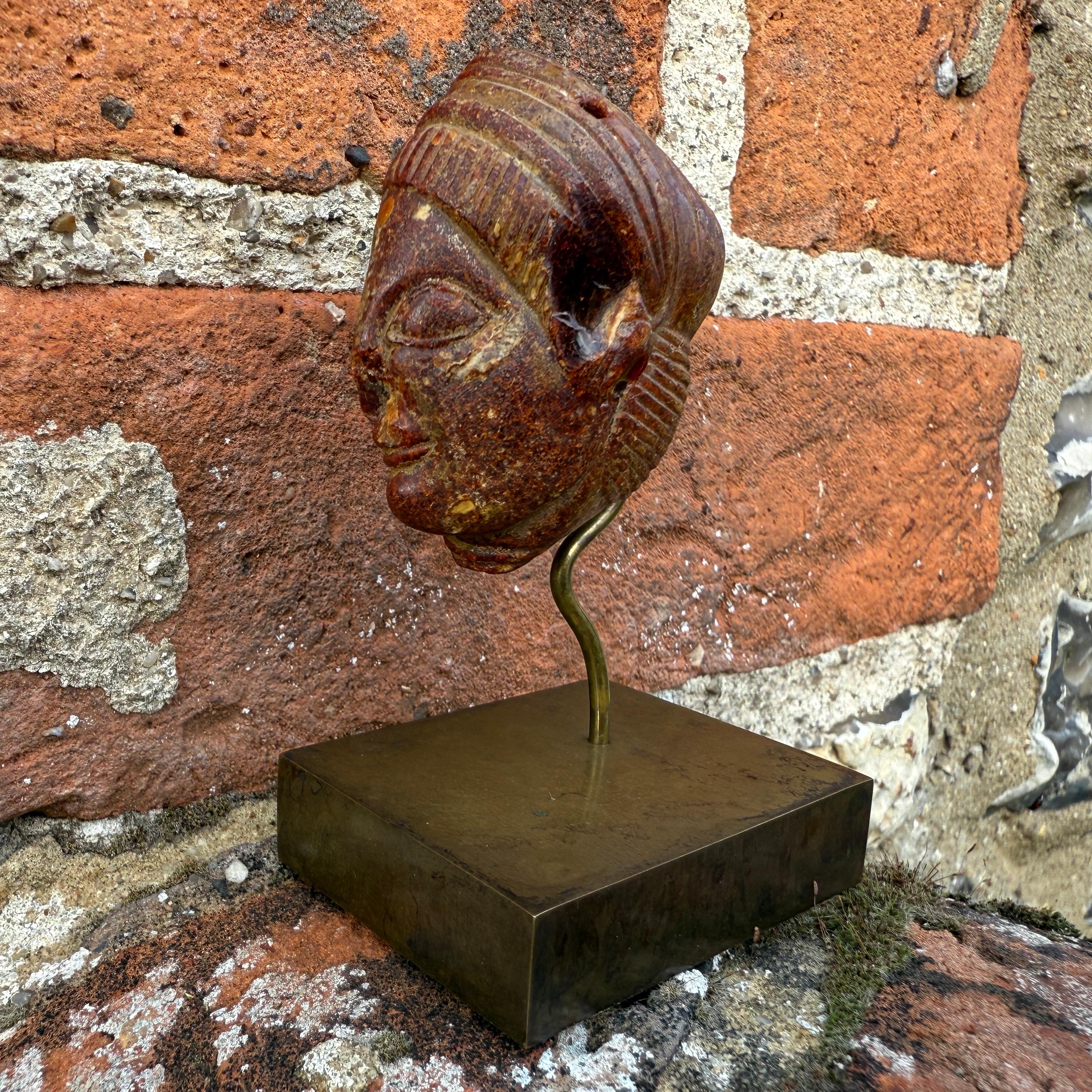 An Etruscan Amber Head Pendant. Etruria, circa 5th century B.C. For Sale 3