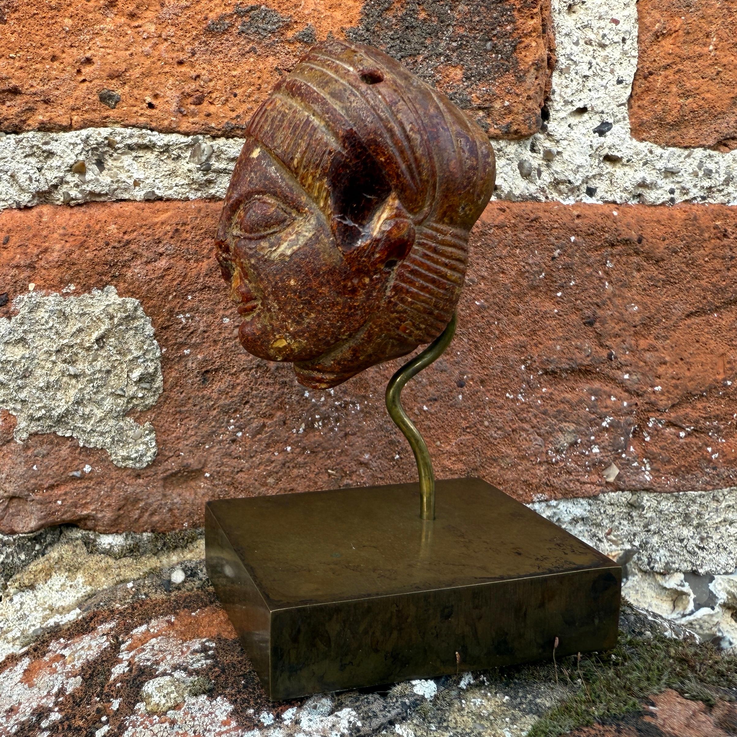 An Etruscan Amber Head Pendant. Etruria, circa 5th century B.C. For Sale 4