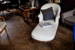 An excellent Napoleon III walnut scroll arm chaise longue