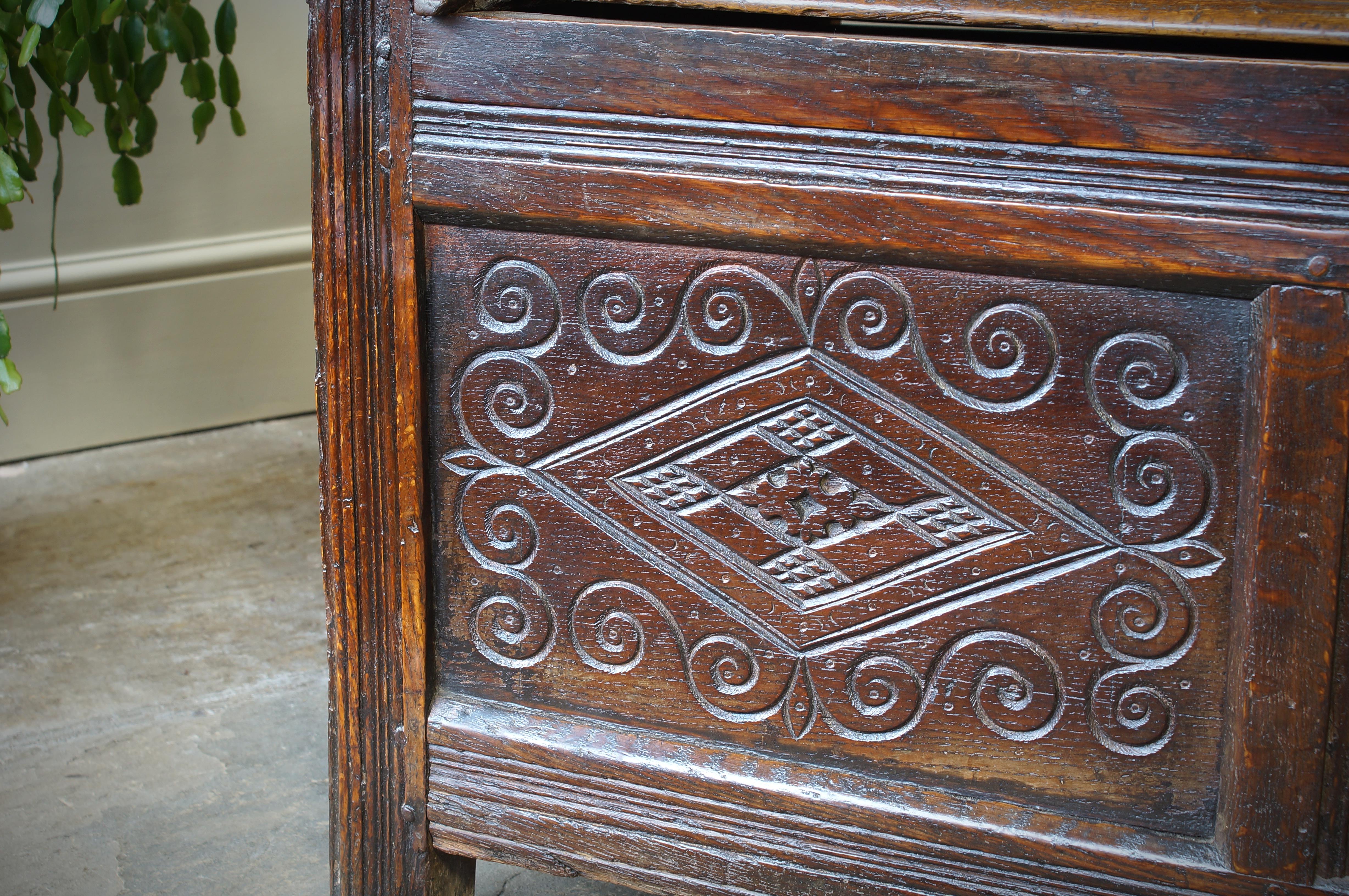 An Exceptional 17th Century English Oak Carved Box Settle. 7