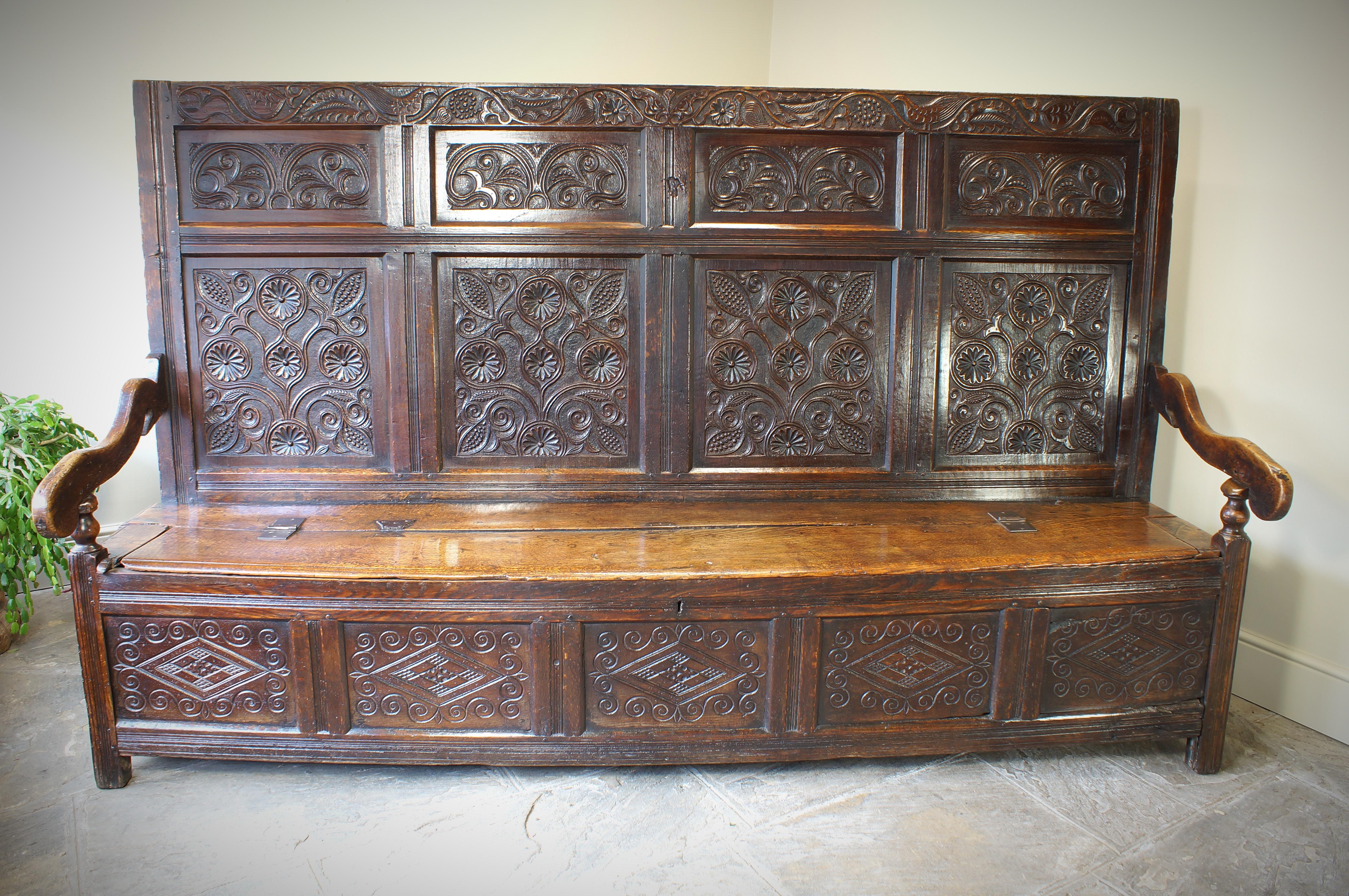 An Exceptional 17th Century English Oak Carved Box Settle. 8