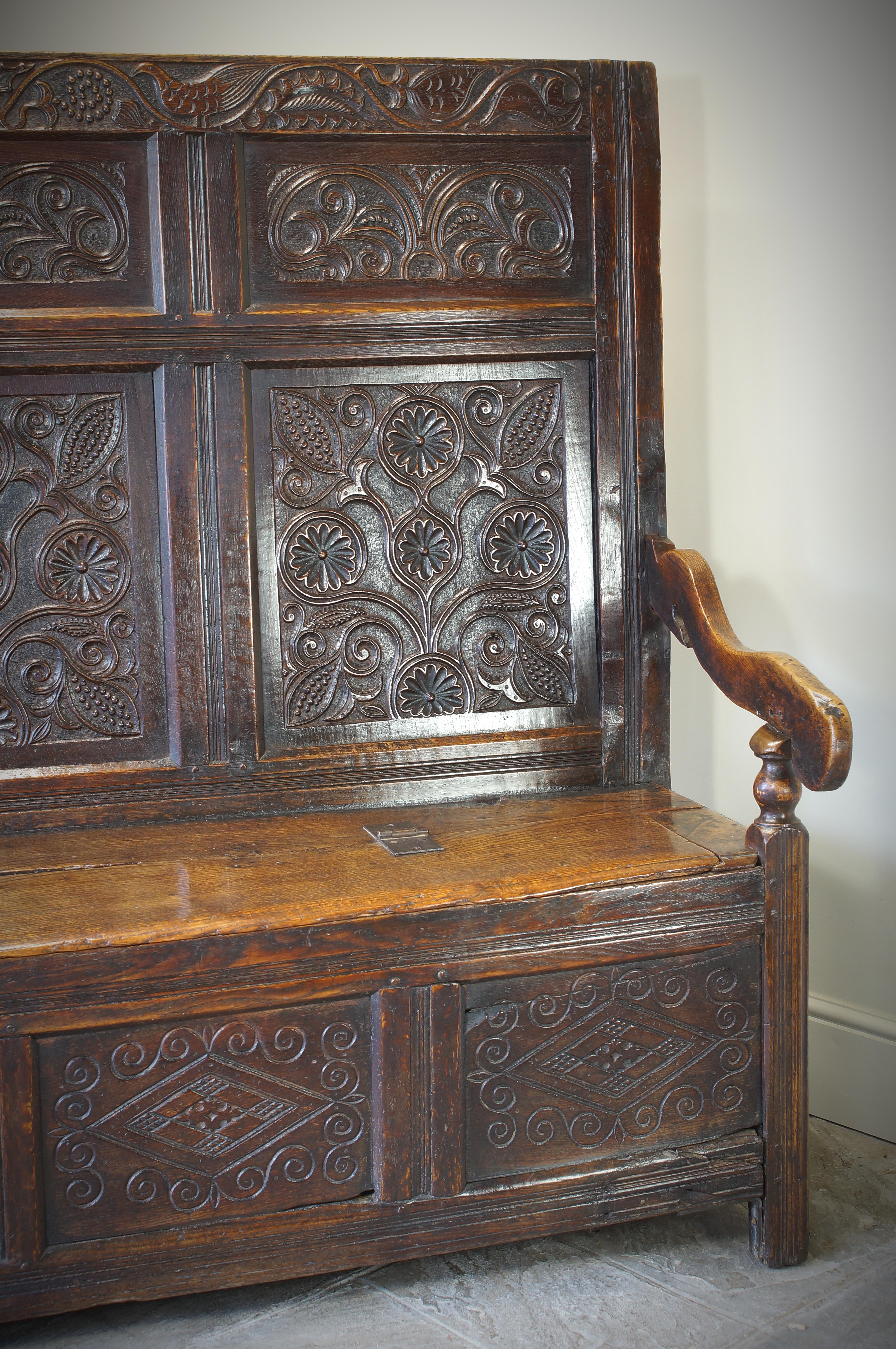 An Exceptional 17th Century English Oak Carved Box Settle. 9