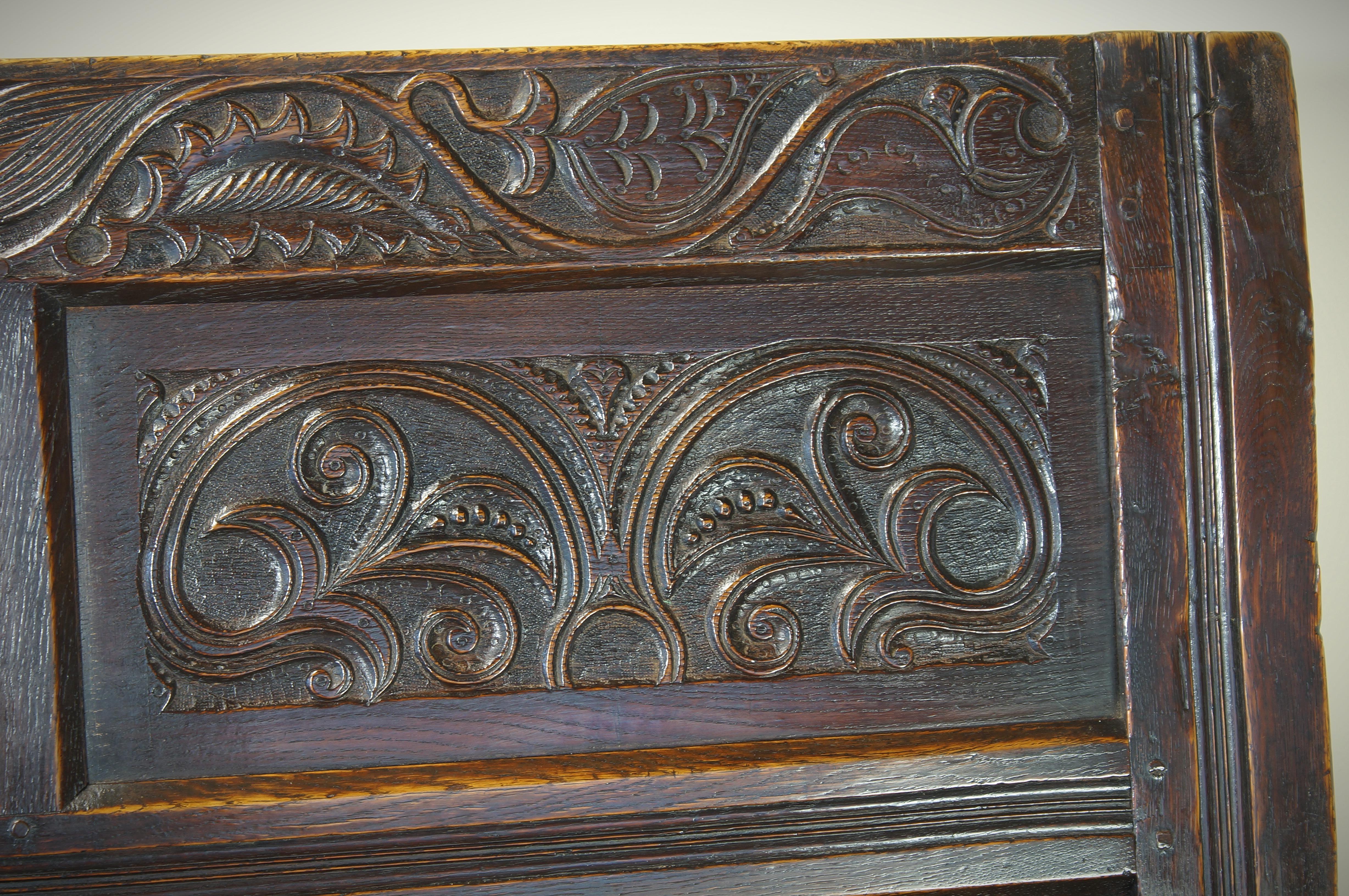 Late 17th Century An Exceptional 17th Century English Oak Carved Box Settle.