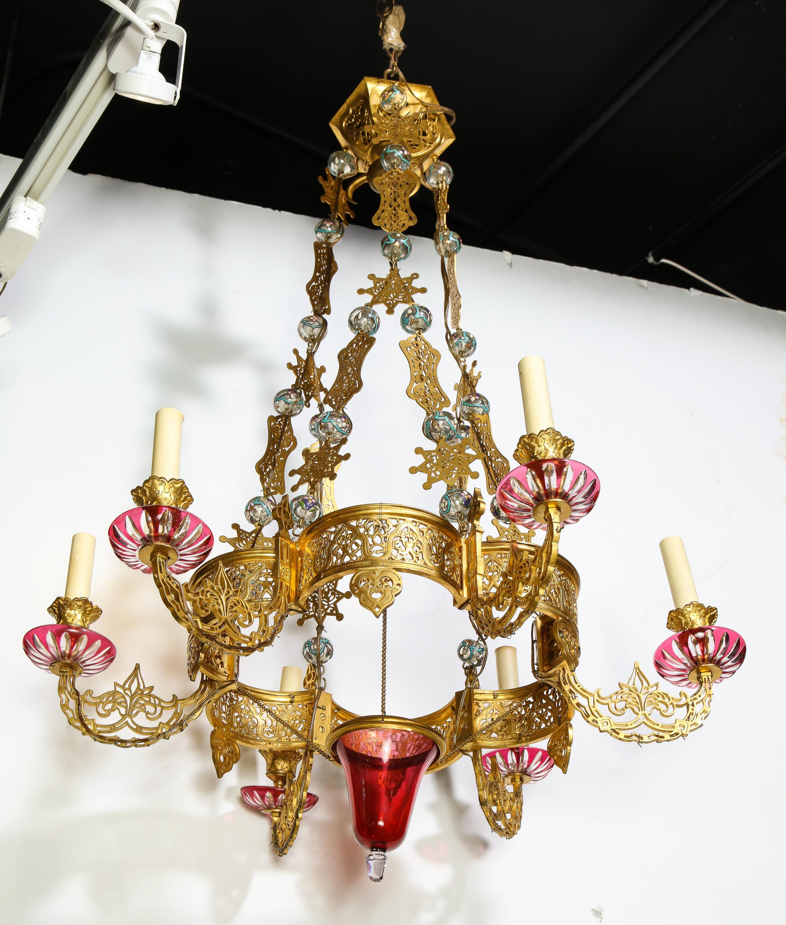 An exceptional and rare Islamic Alhambra bronze and enameled glass six-light mosque chandelier, circa 1870.

This one of a kind, exceptionally elegant, jewel-quality chandelier, is one of the most beautiful chandeliers we have seen in this style.