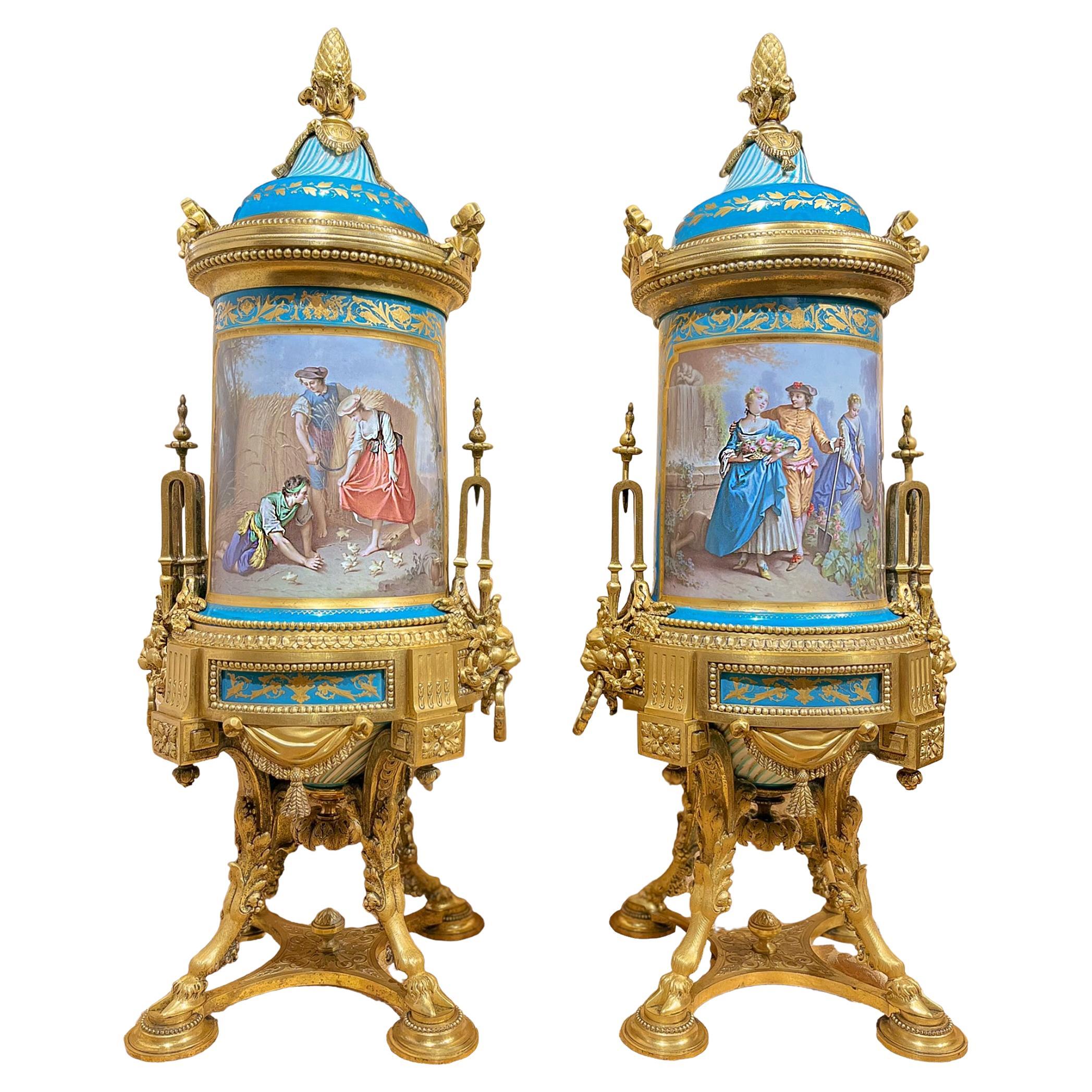 Exceptional and Unusual Pair of Porcelain Cerulean and Ormolu Urns For Sale