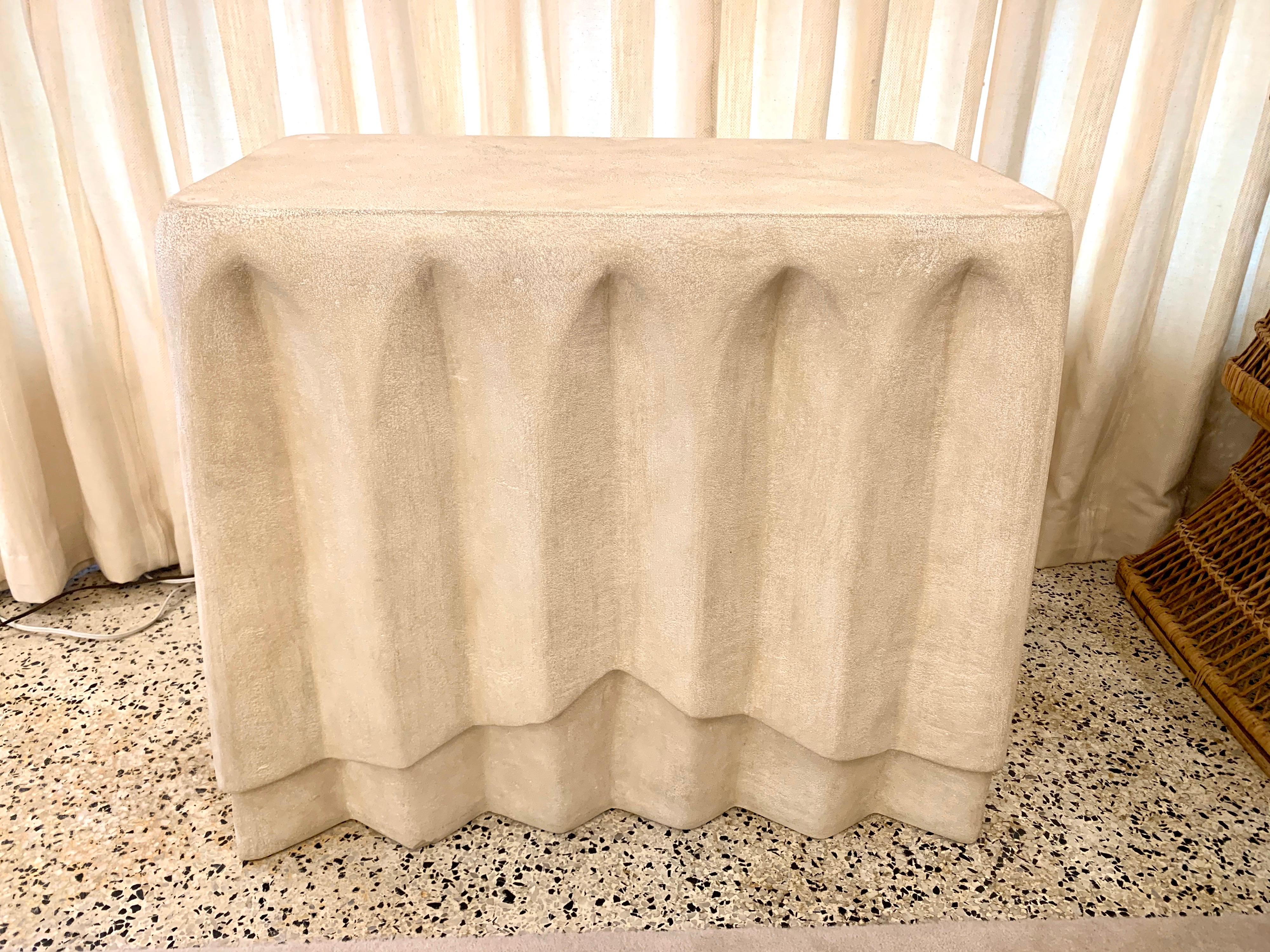 A rarely found, this vintage cast plaster console appears to be draped in fabric - mimicking a neoclassical English design. Natural color/slightly beige in tone from circa 1960s.