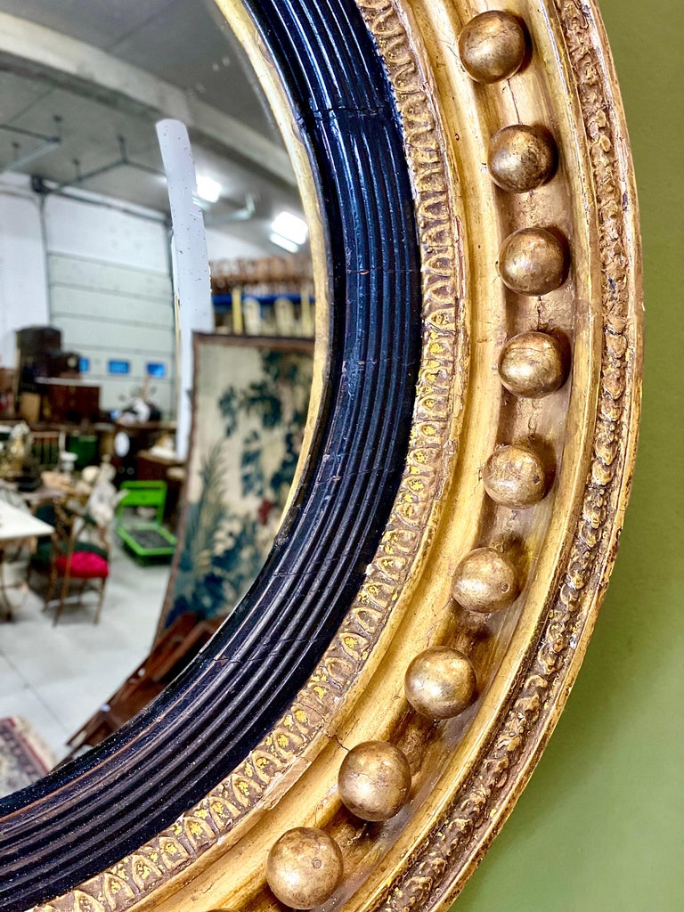 Exceptional Early 19th Century Regency Giltwood Convex Mirror For Sale