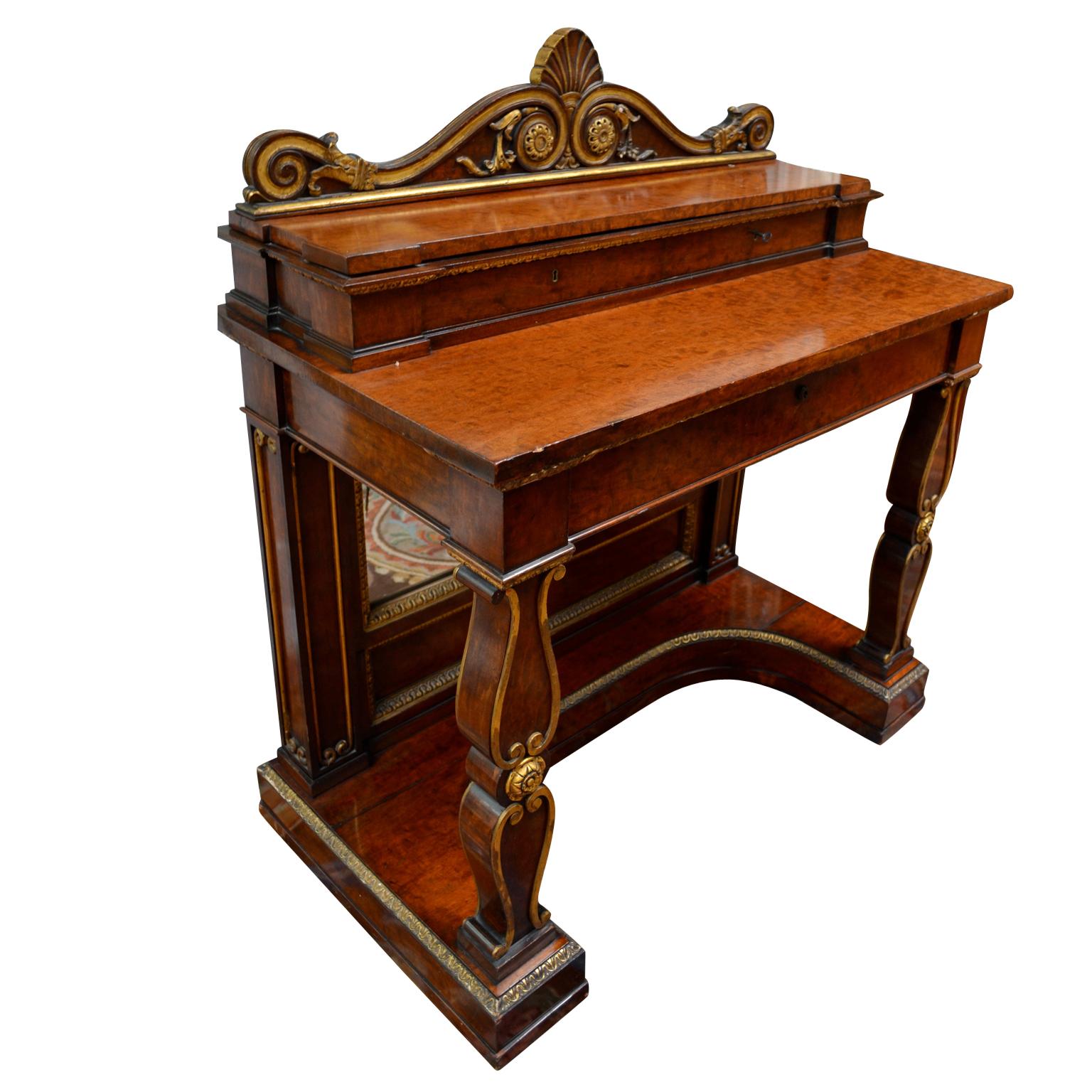 An exceptionally rare once in a lifetime offering of a Georgian Regency  mahogany and gilt-wood Dressing Table created for and commissioned by King George IV around 1826 for a bedroom in the Royal apartments at Windsor Castle 

When George III moved