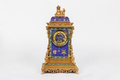 Excepcional juego de reloj francés de cinco piezas Japonisme Ormolu y Esmalte Champleve