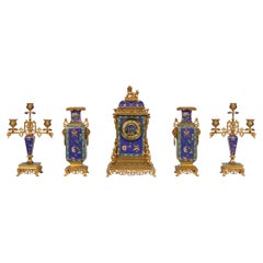 An Exceptional French Japonisme Ormolu and Champleve Enamel Five Piece Clock Set