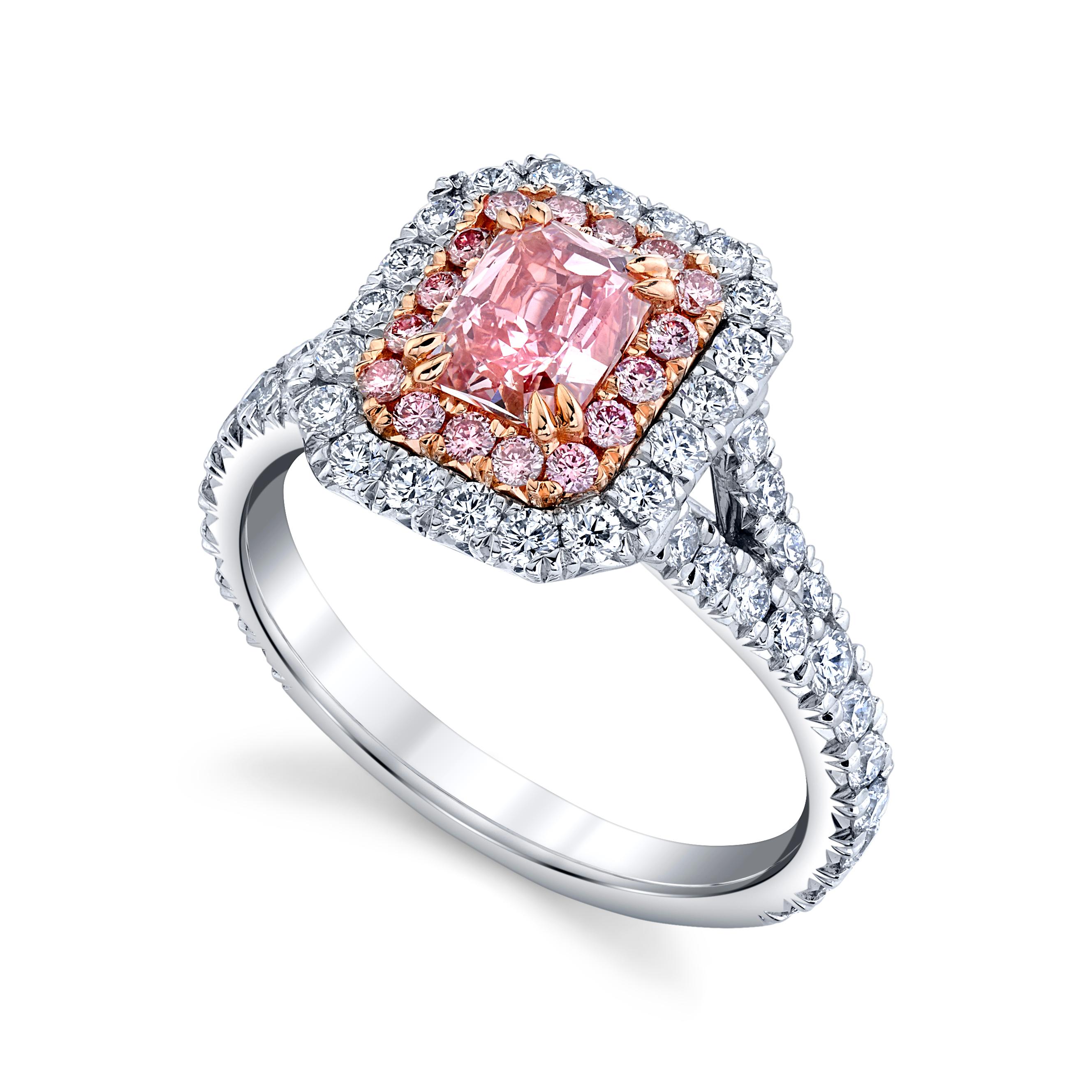 This sexceptional 0.77ct VS2, Radiant Fancy Intense Pink Diamond is set in Platinum and 18K Rose Gold Ring together with a double halo of Pink and colorless diamonds 
16 pcs Radiat Pink Diamonds =0.19cttw 
plus 66 pcs Radiant F/G color