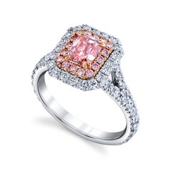 Exceptional GIA Certified Radiant 0.77 Carat Fancy Intense Pink Diamond Ring