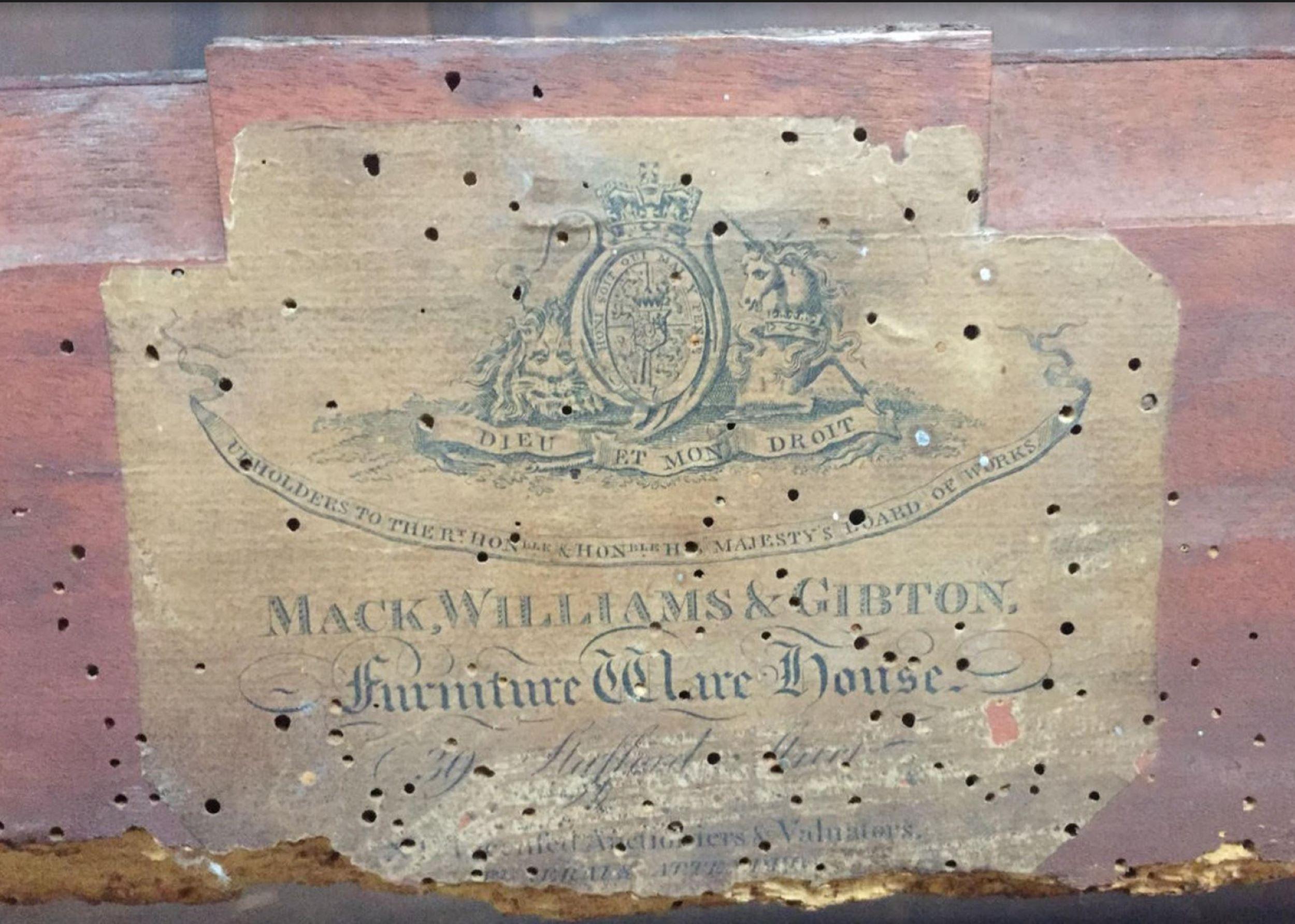 Made for the State visit of George IV in 1821 to Ireland after his coronation, by repute. By Mack, Williams and Gibton, Dublin, and with their label. Of French lit-en-bateau form, the frame carved with laurel leaves, Tudor rose paterae and lion