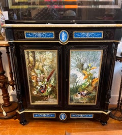 An Exceptional Napoleon III Cabinet with Large Hand Painted Sevres Plaques.