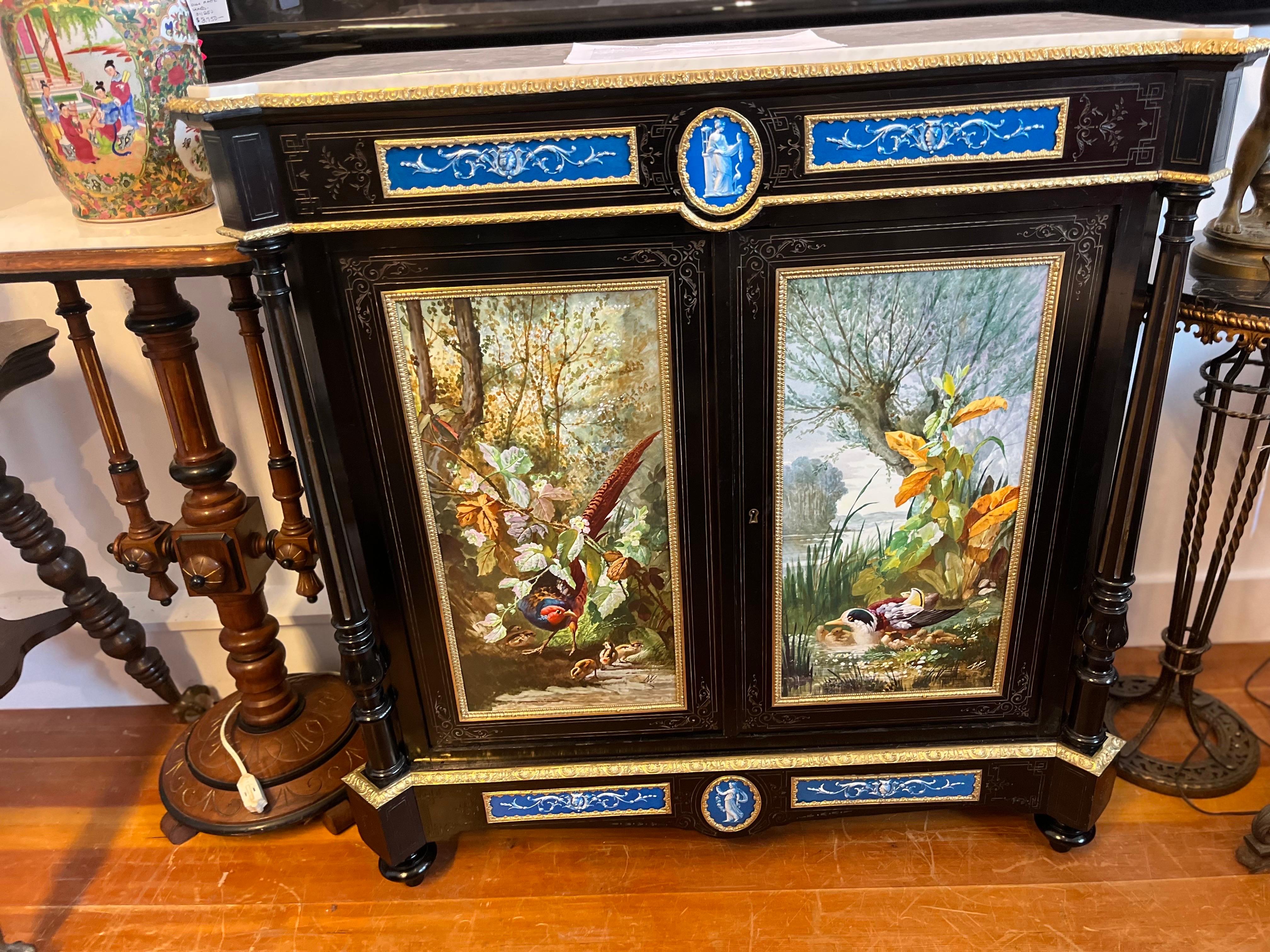 An Exceptional Napoleon III Cabinet with Large Hand Painted Sevres Plaques.  1