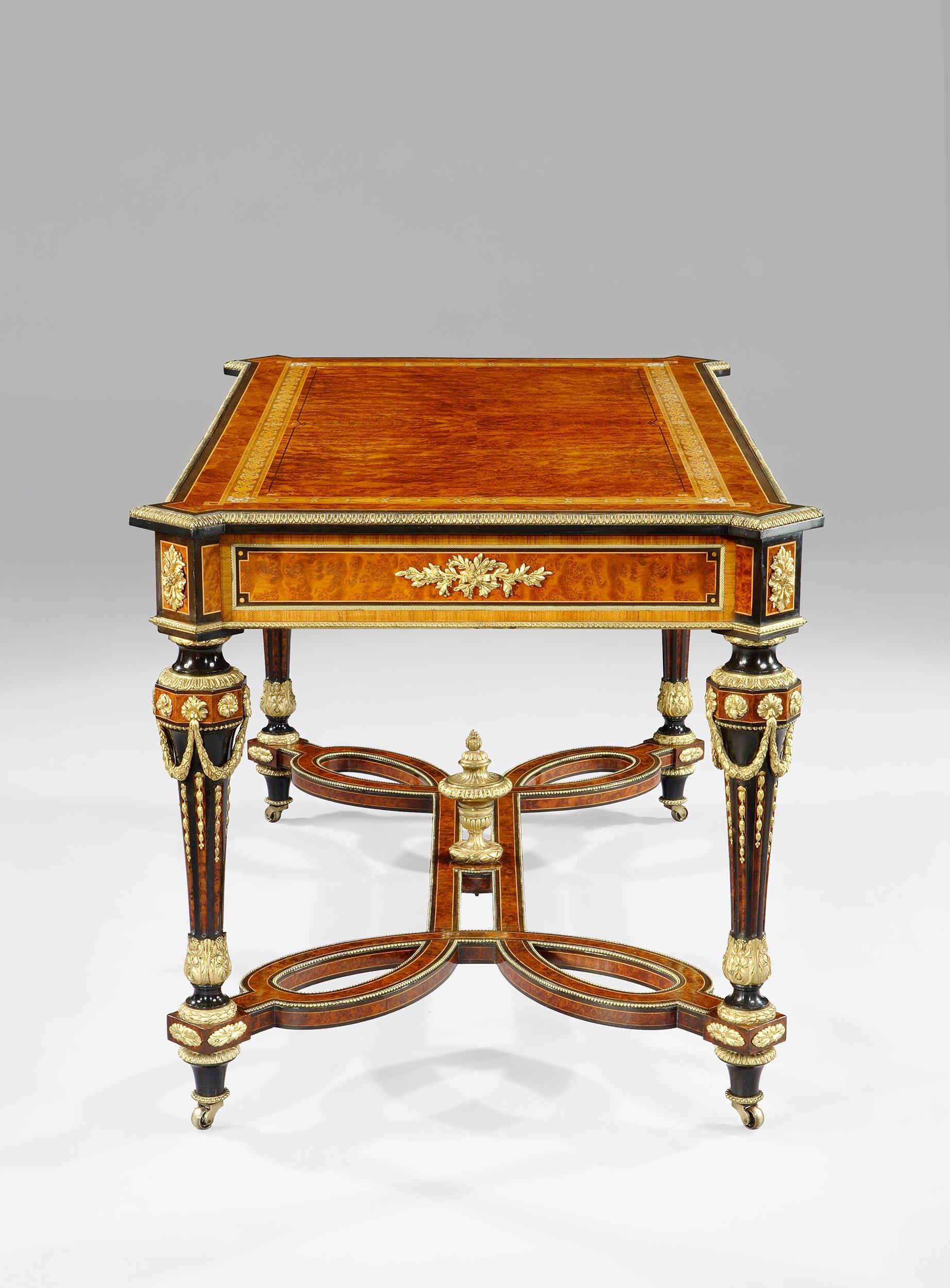 An exhibition quality centre table firmly attributed to Holland & Sons

Constructed in thuya wood, with sycamore, bois de Violette, boxwood and various woods utilised in the inlaywork, with entensive, finely cast and chased gilt bronze mounts.