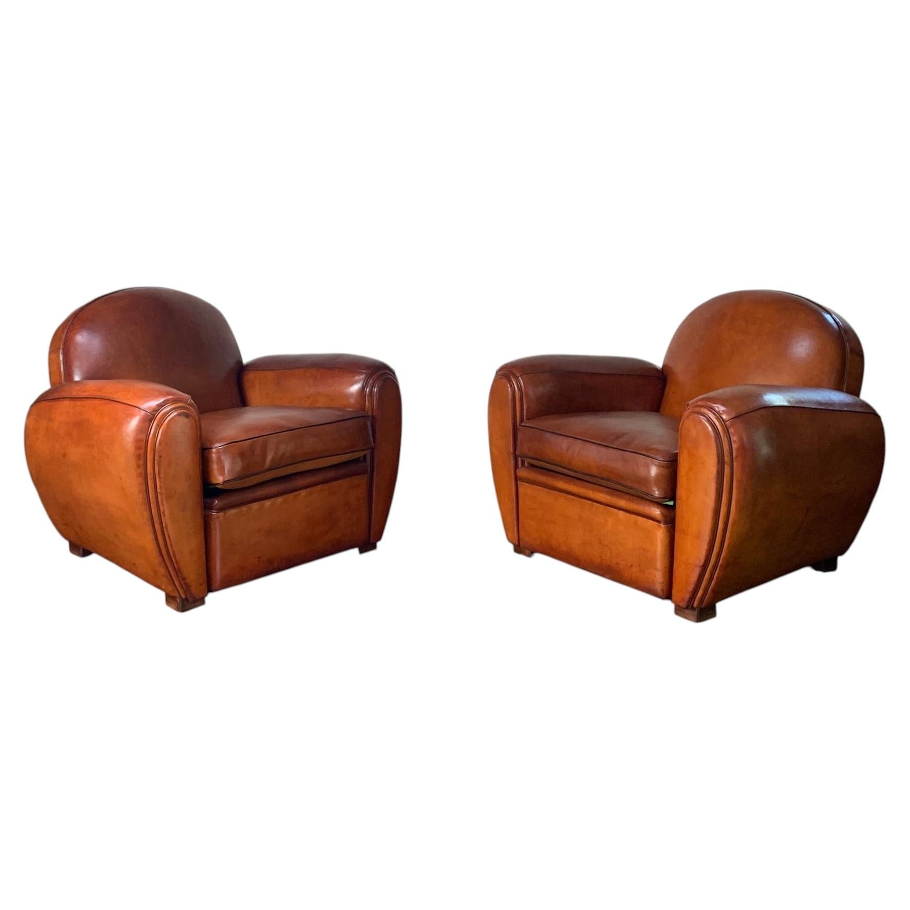 An Exceptional Pair of French Leather Club Chairs Cuban Round Models Circa 1950