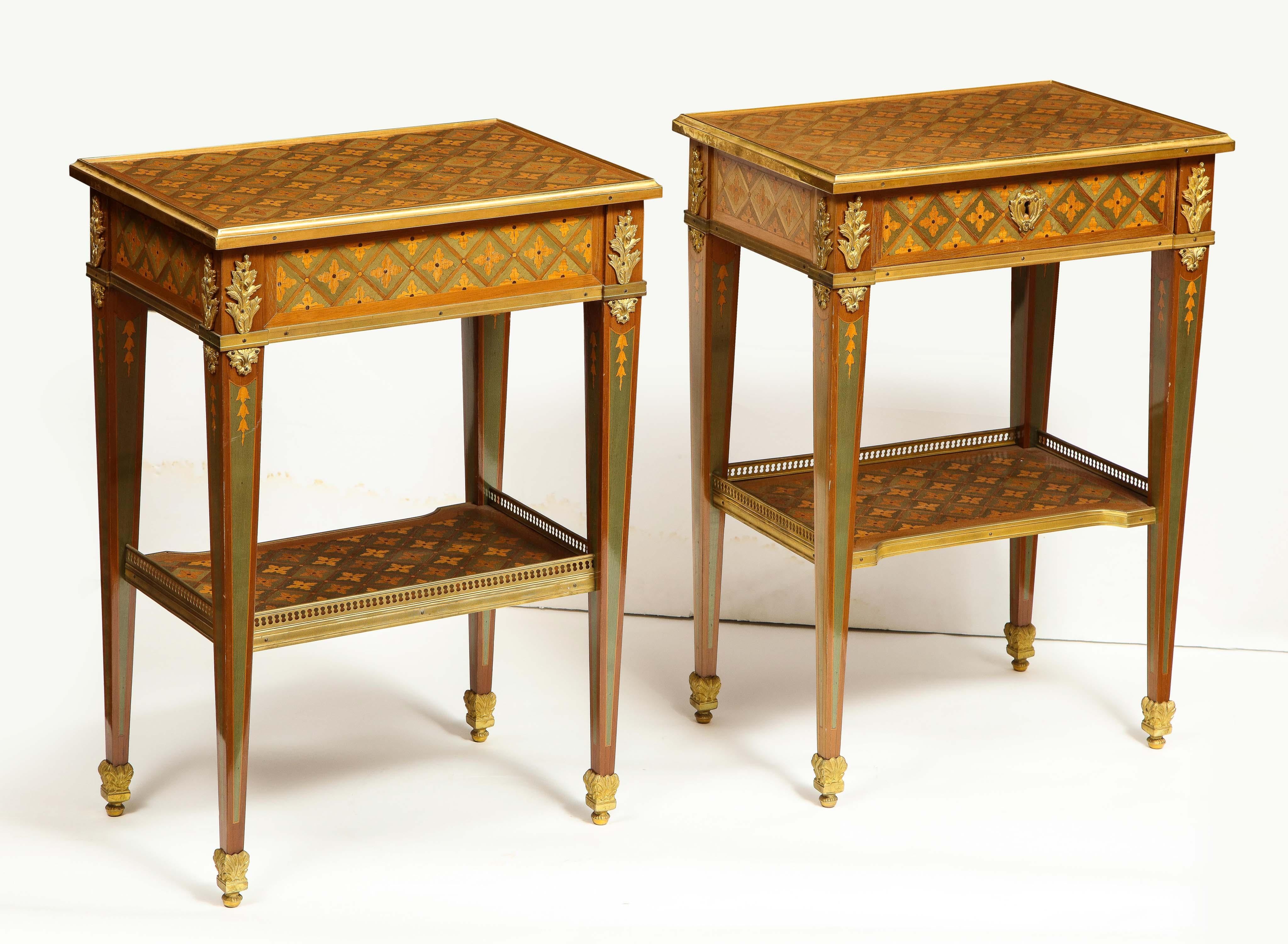 Louis XVI Exceptionnelle paire de tables d'appoint françaises en parqueterie et marqueterie montées en bronze doré en vente